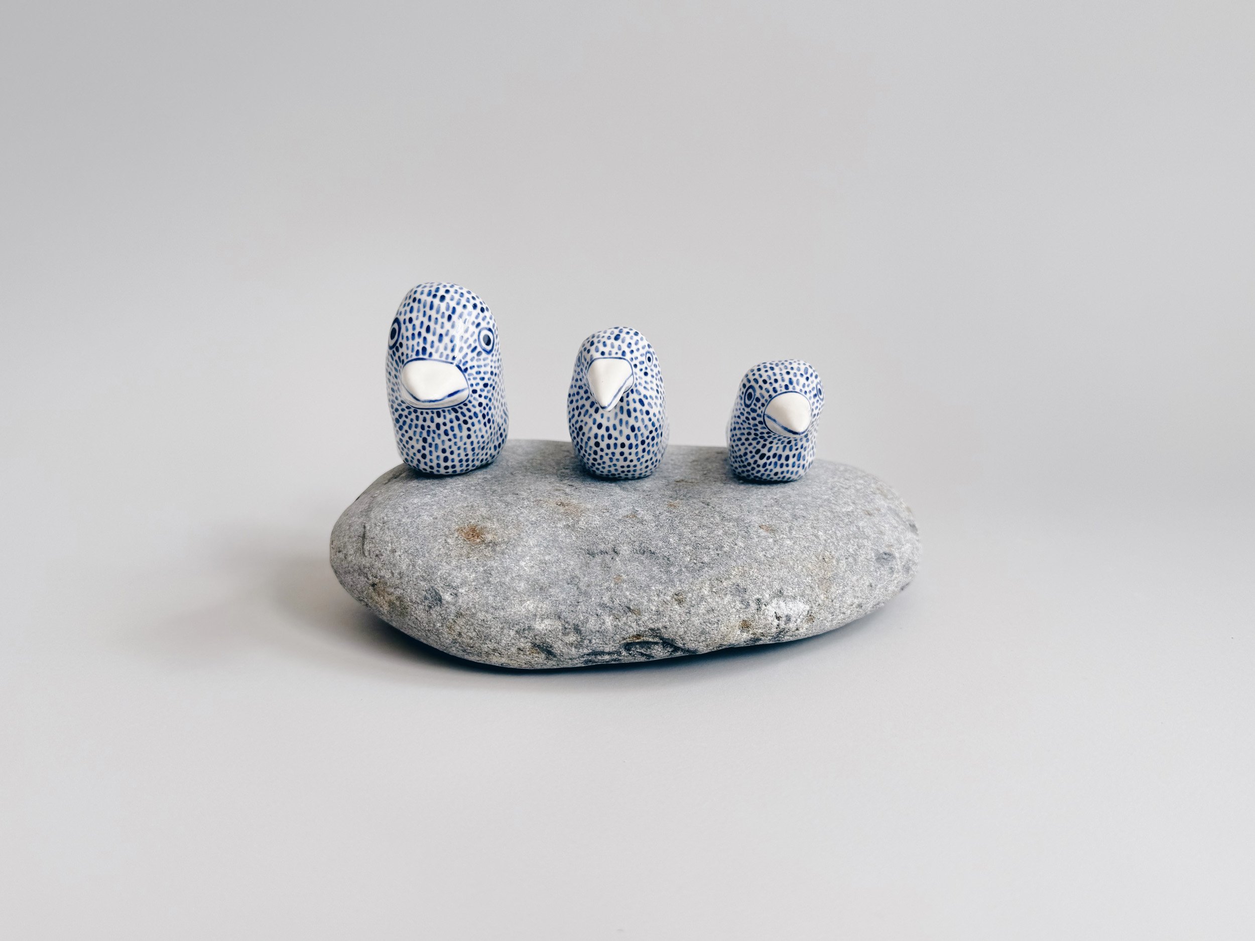 Blue and white, handmade ceramic bird.
