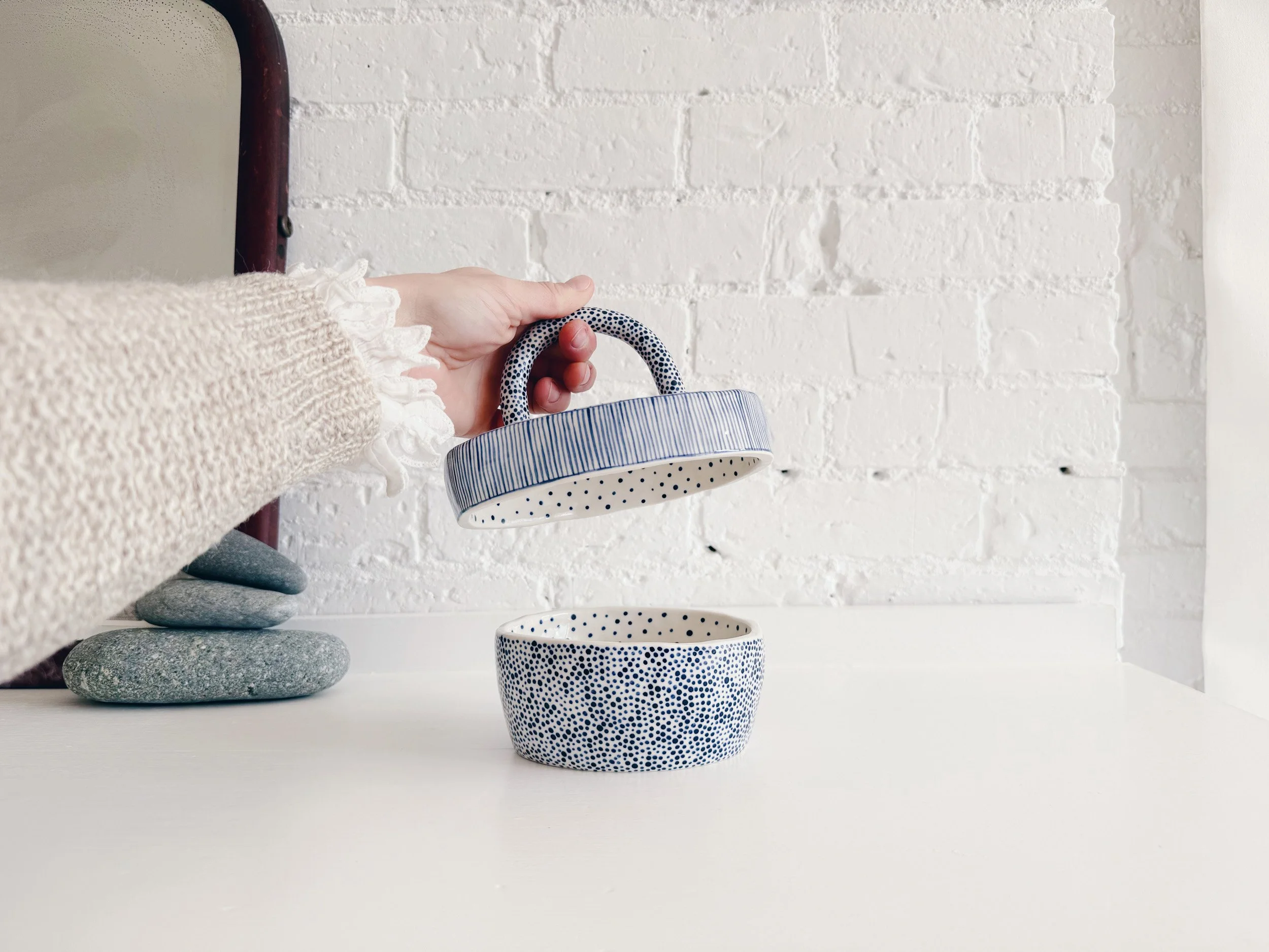 Blue and white, handmade ceramic jar.