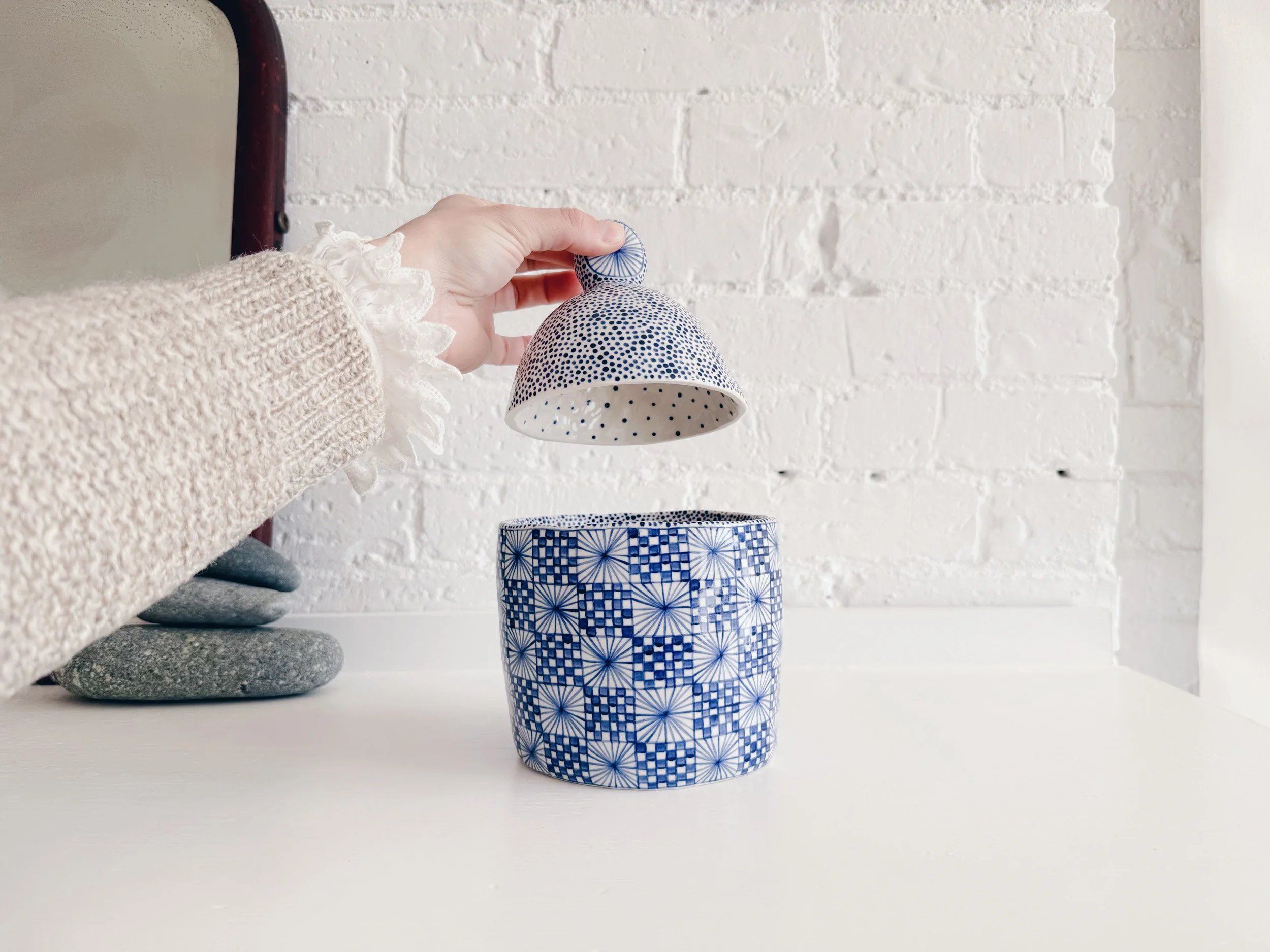 Blue and white, handmade ceramic jar.