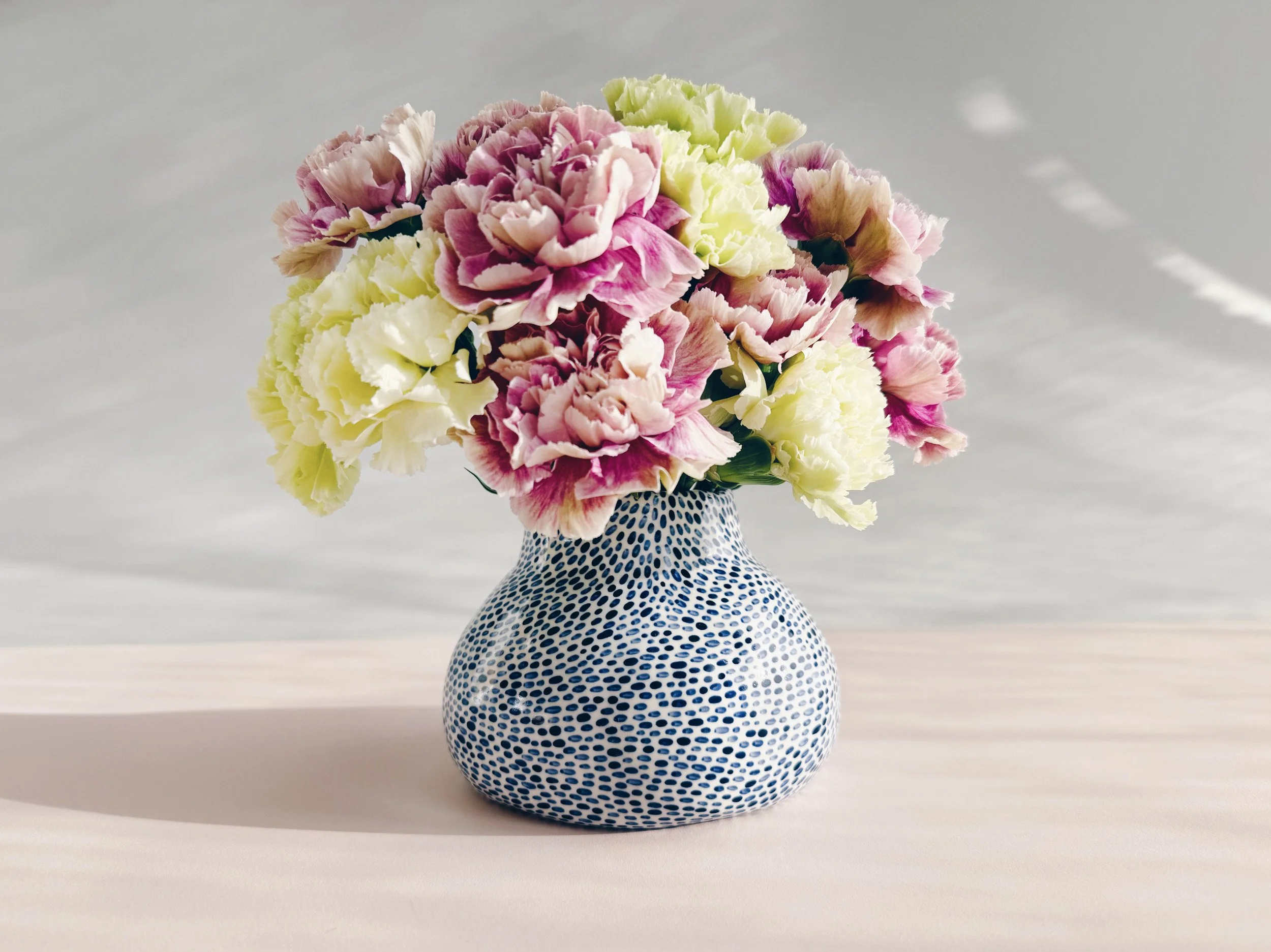 Blue and white, handmade ceramic vase.