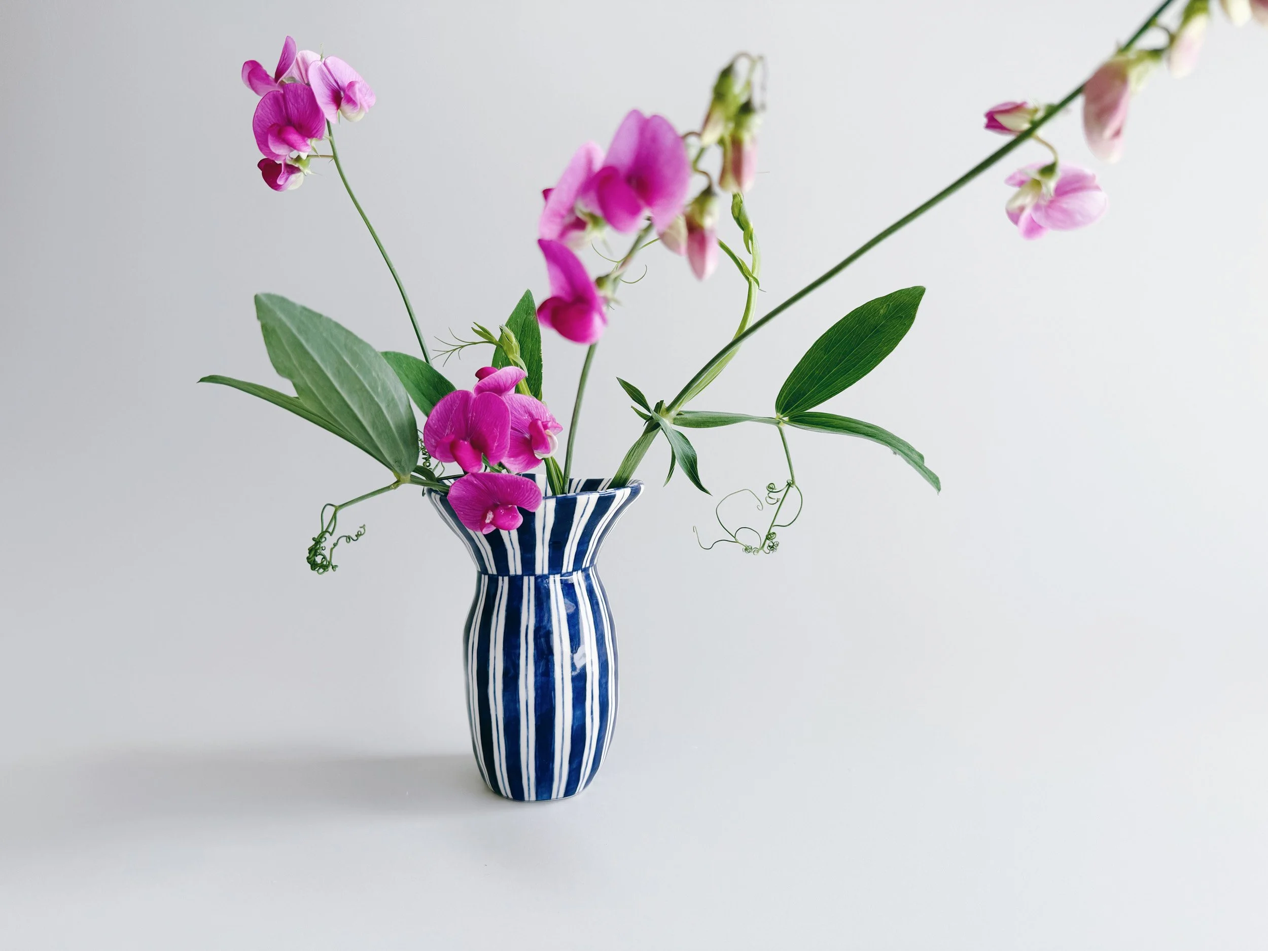 Blue and white, handmade ceramic vase.