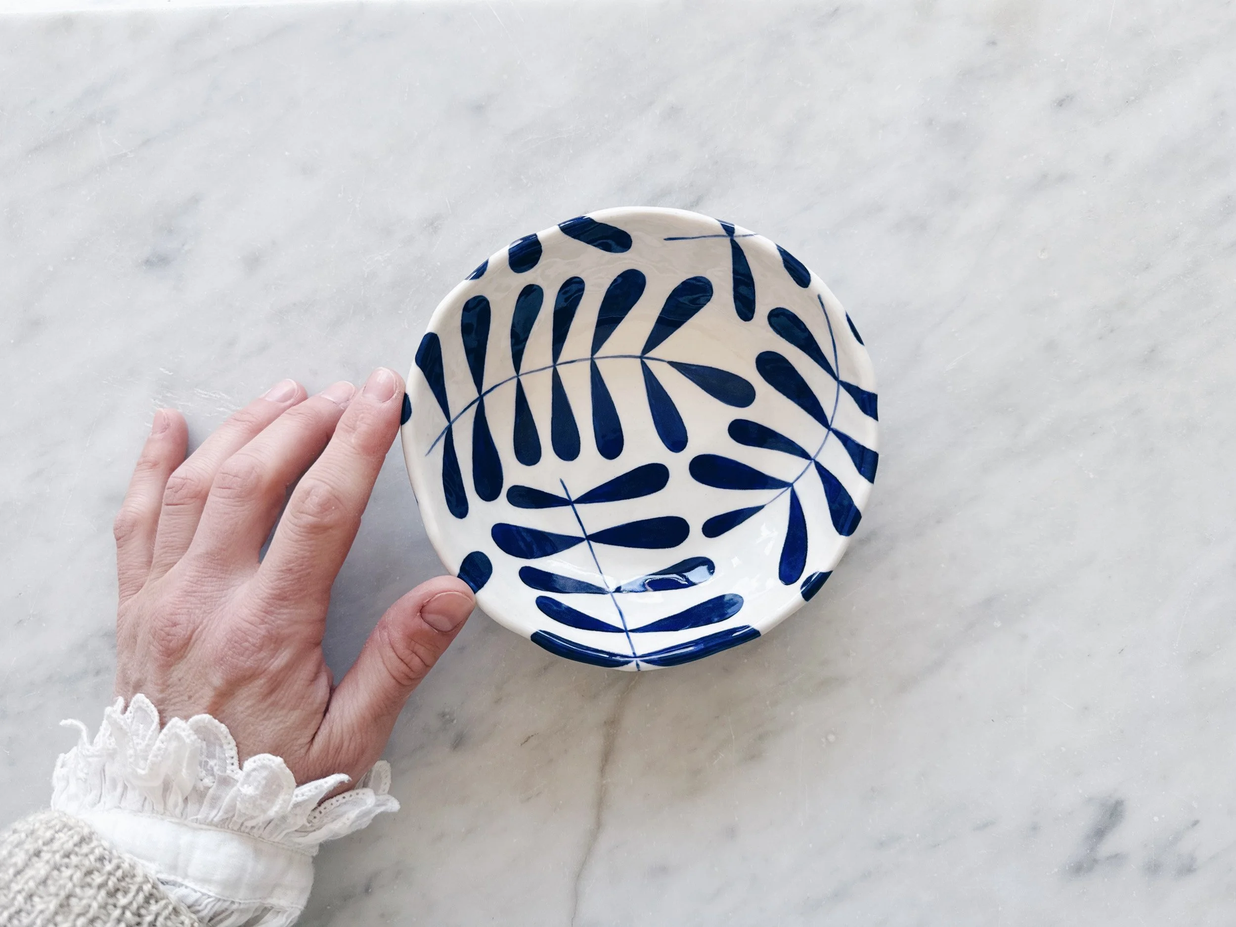 Blue and white, handmade ceramic bowl.