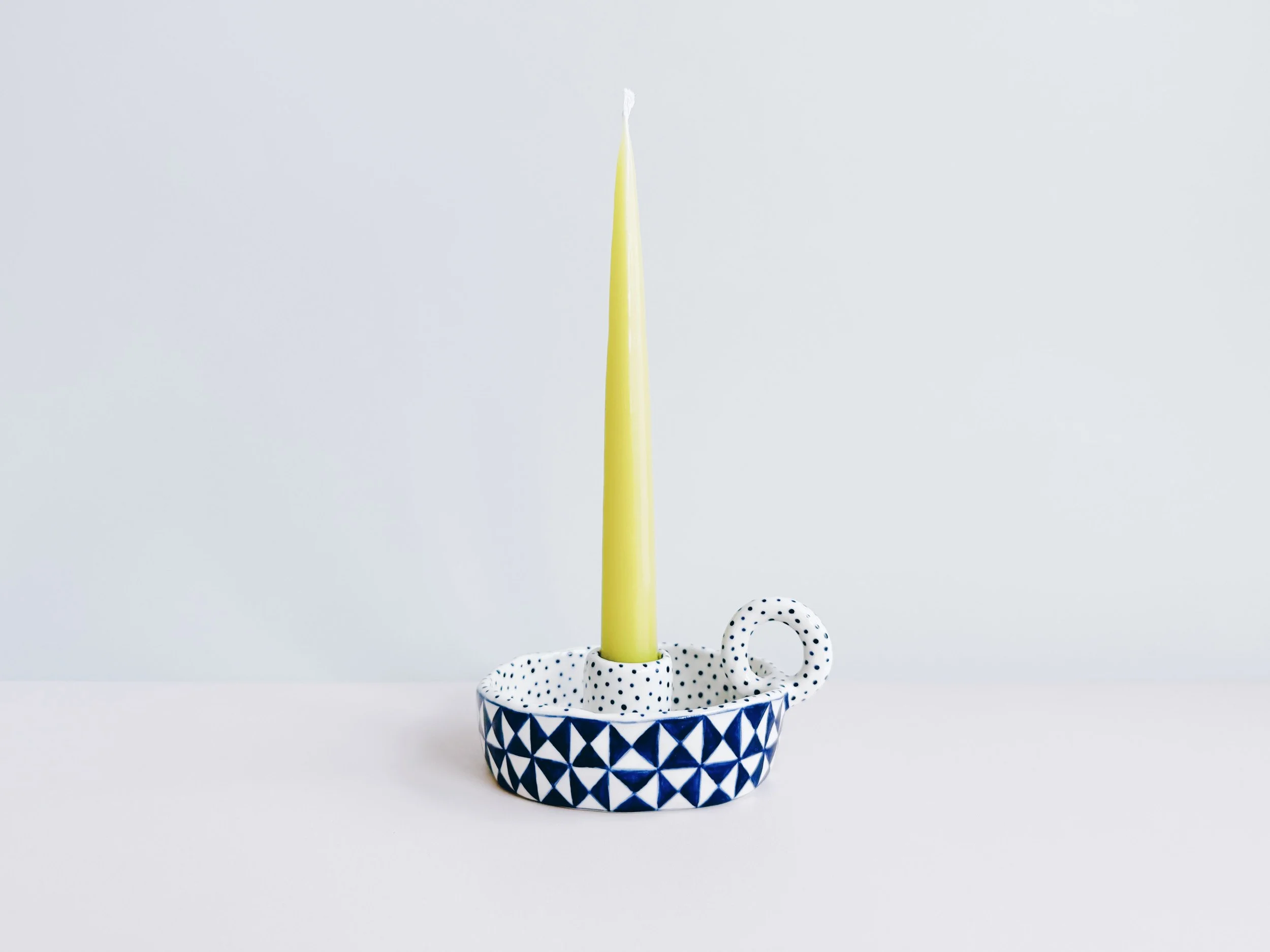 Blue and white, handmade ceramic candleholder.