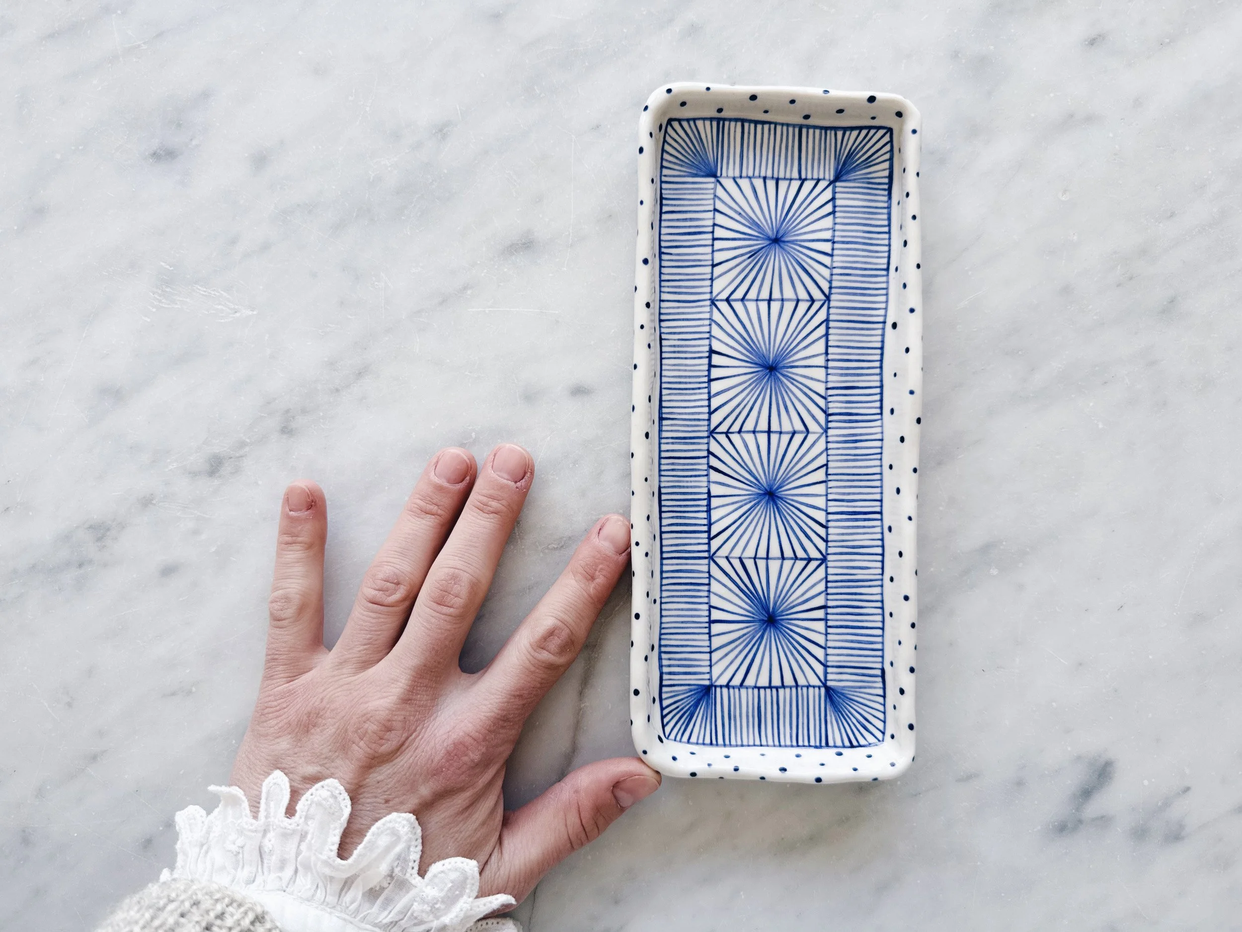 Blue and white, handmade ceramic plate.