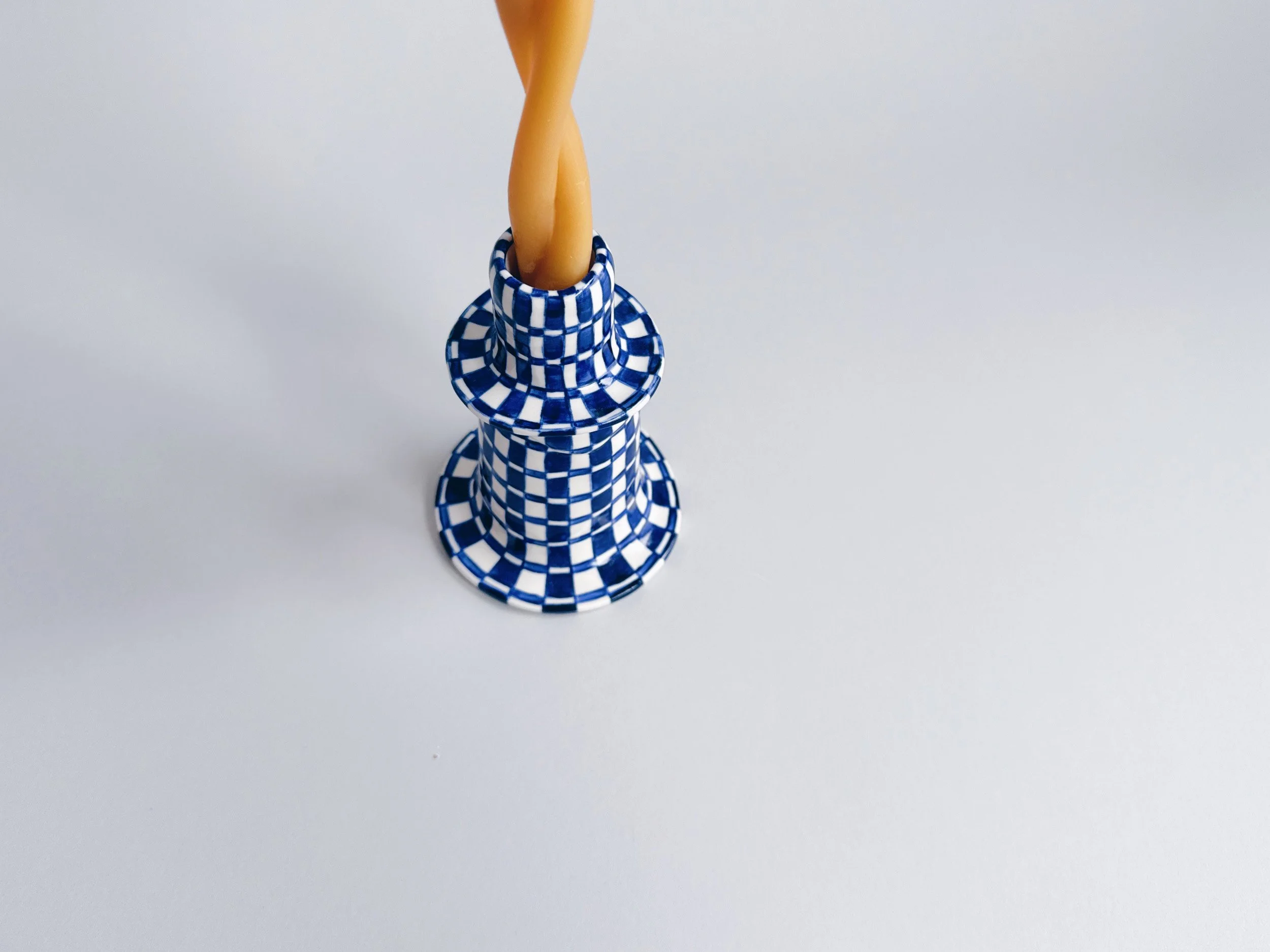 Blue and white, handmade ceramic candleholder.