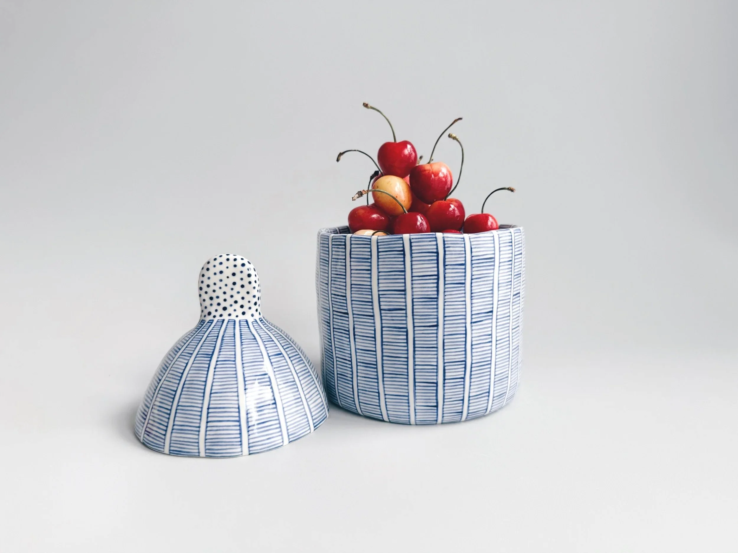 Blue and white, handmade ceramic jar.