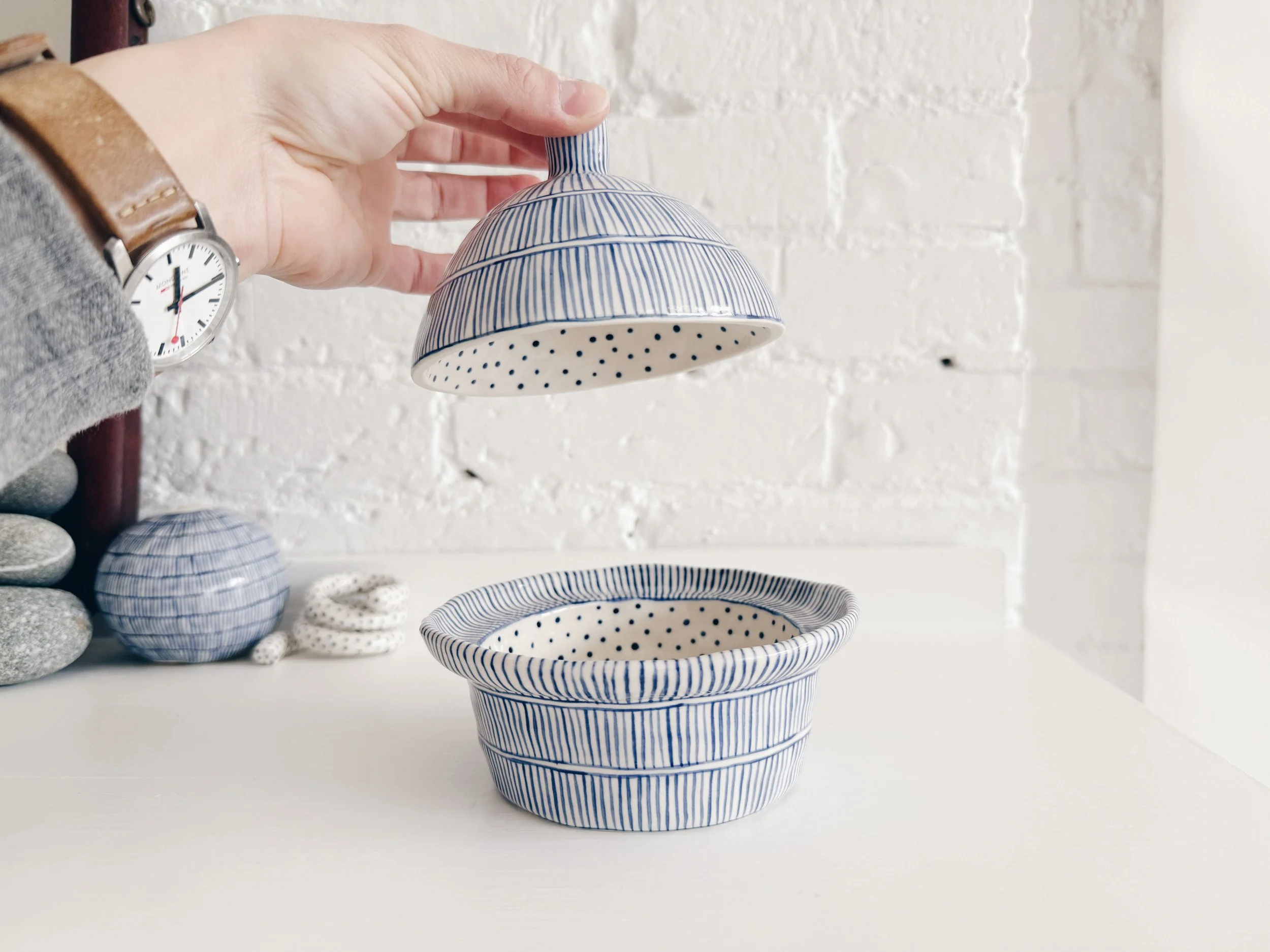 Blue and white, handmade ceramic jar.