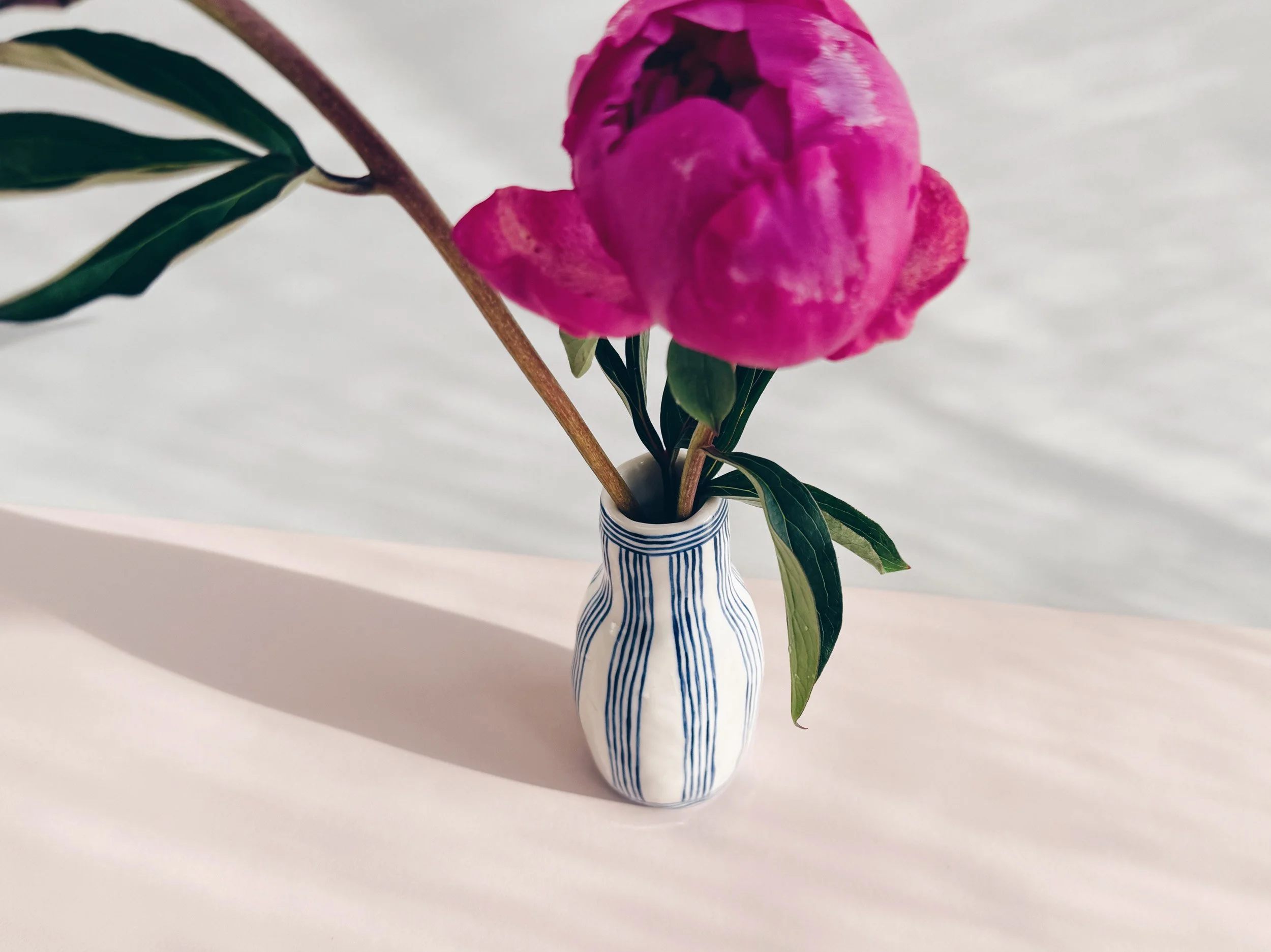 Blue and white, handmade ceramic vase.