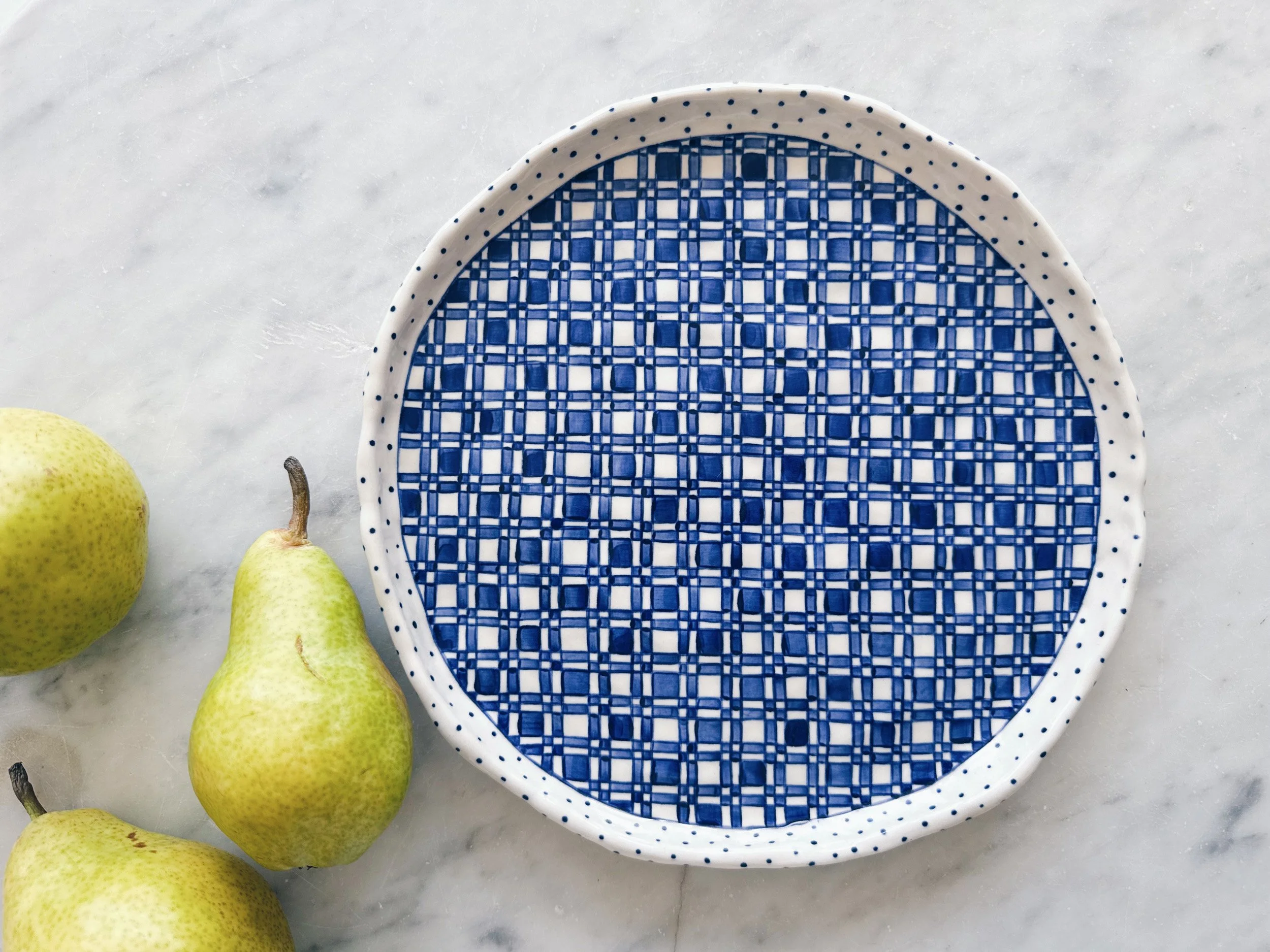 Blue and white, handmade ceramic plate.