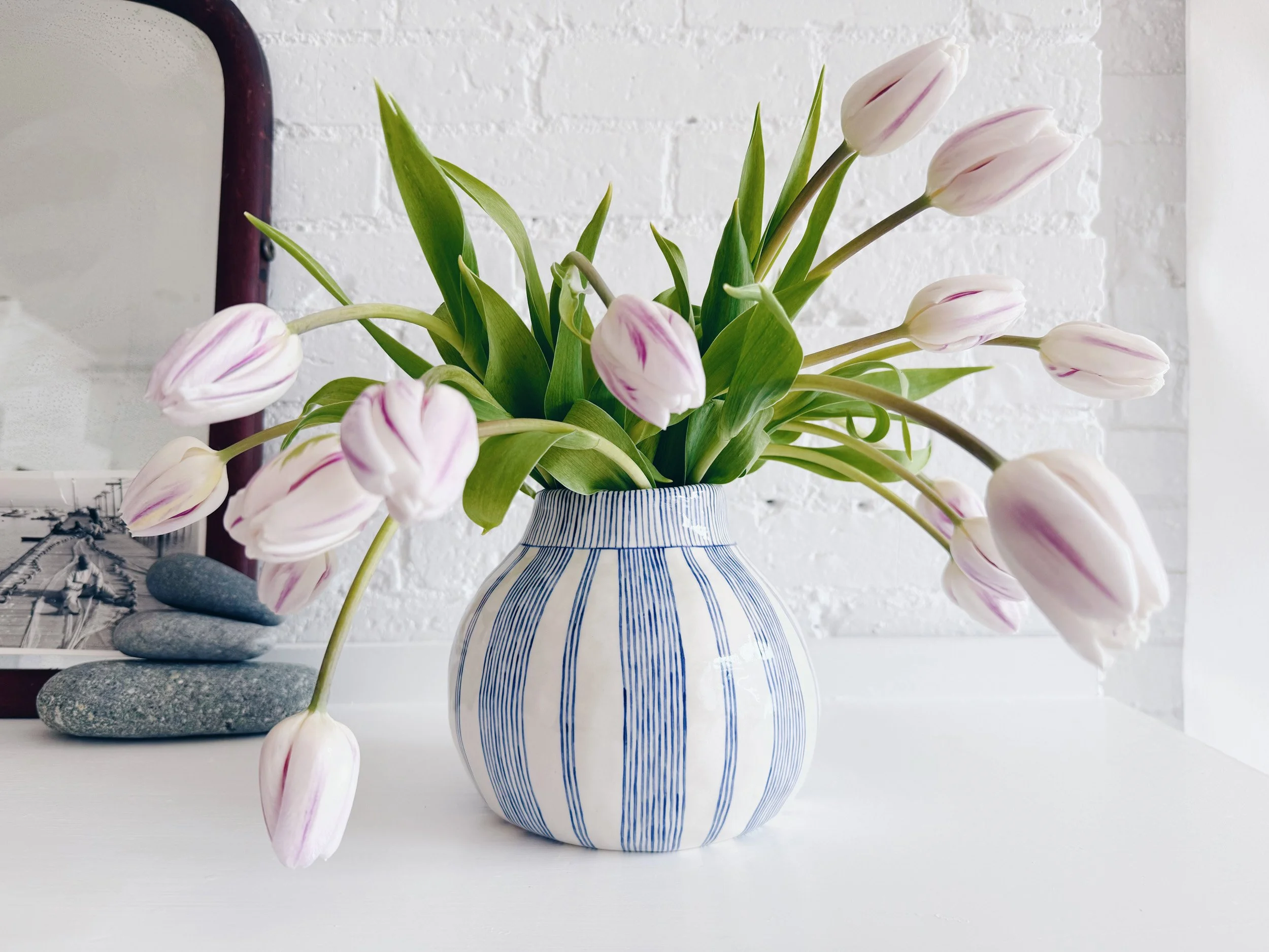 Blue and white, handmade ceramic vase.