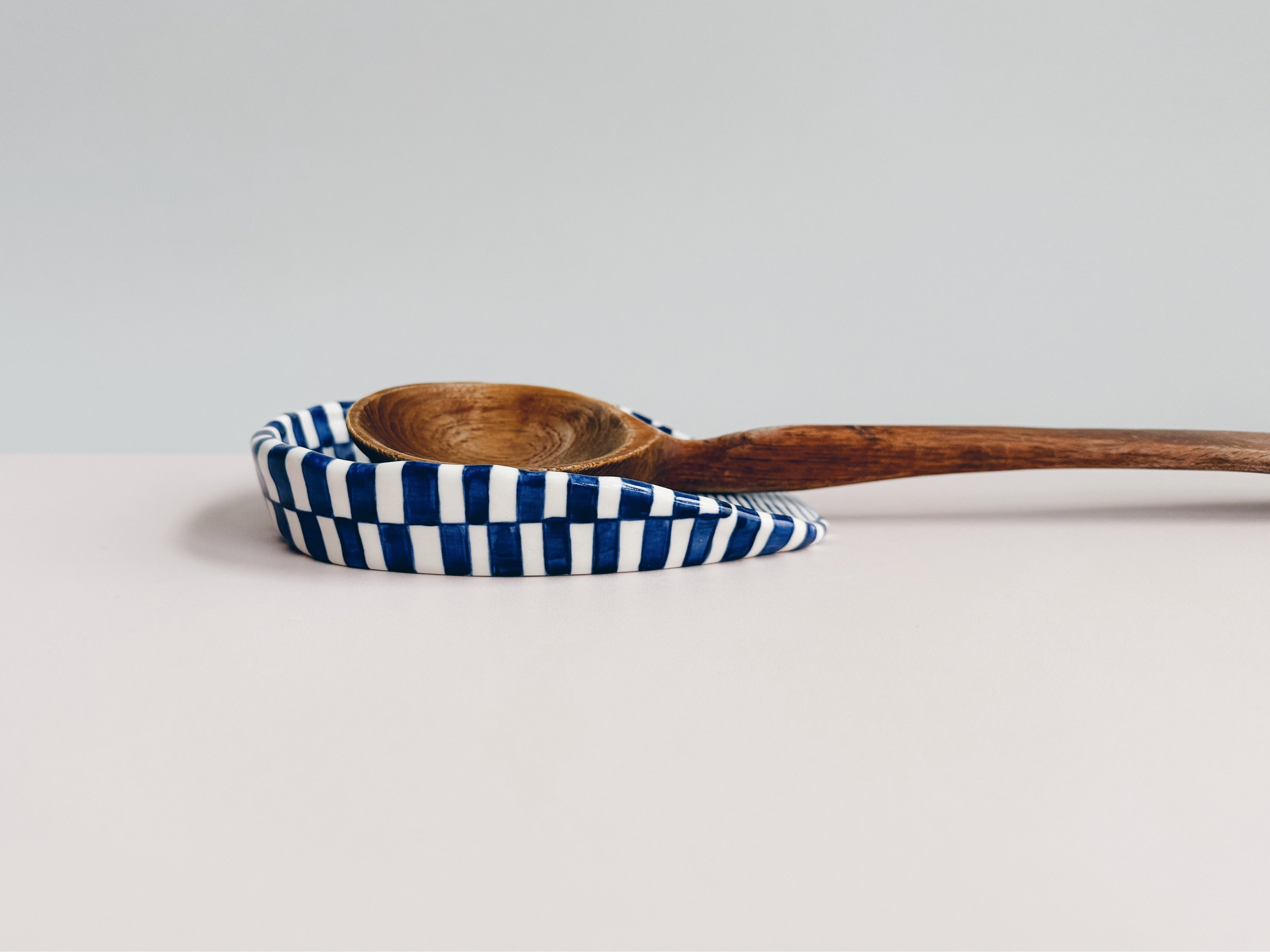 Blue and white, handmade ceramic spoon rest.