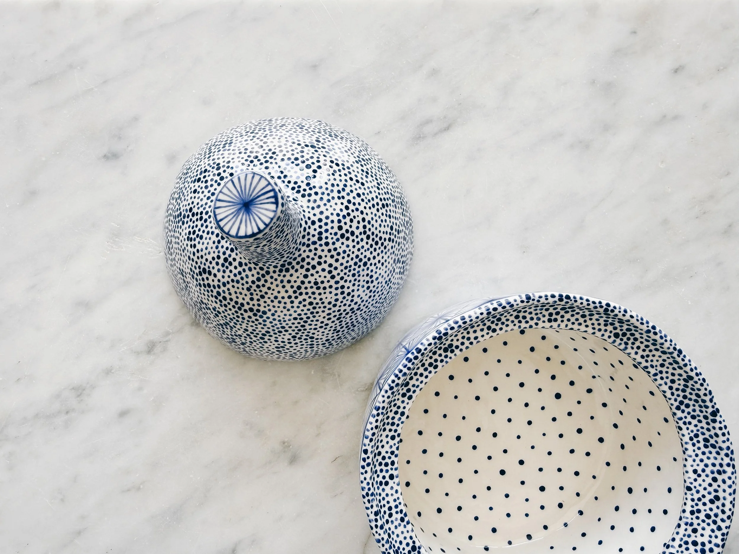 Blue and white, handmade ceramic jar.