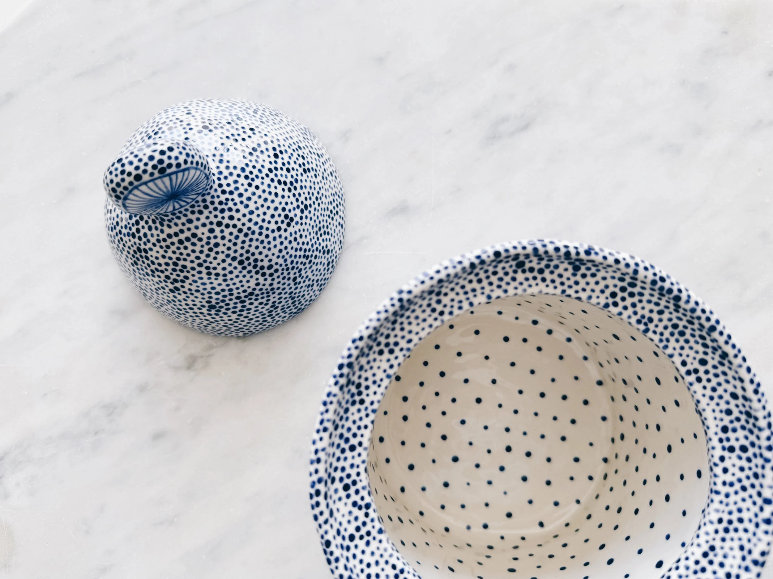 Blue and white, handmade ceramic jar.