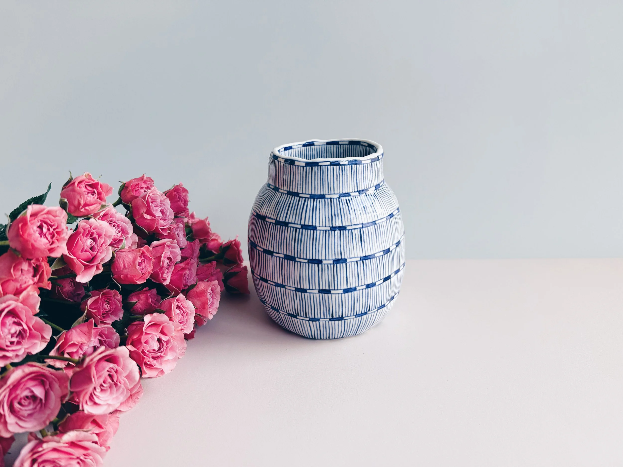 Blue and white, handmade ceramic vase.