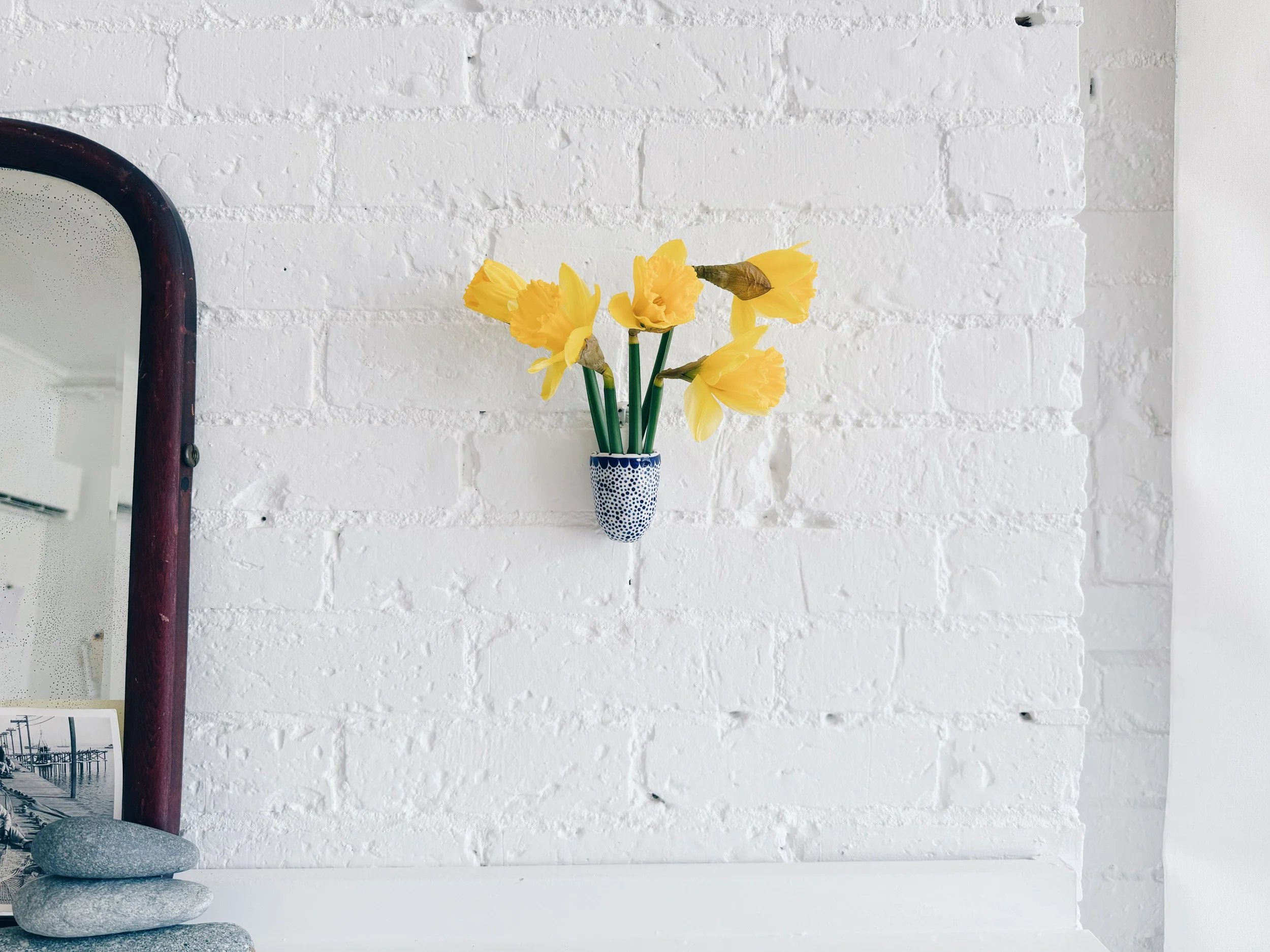 Blue and white, handmade ceramic vessel.