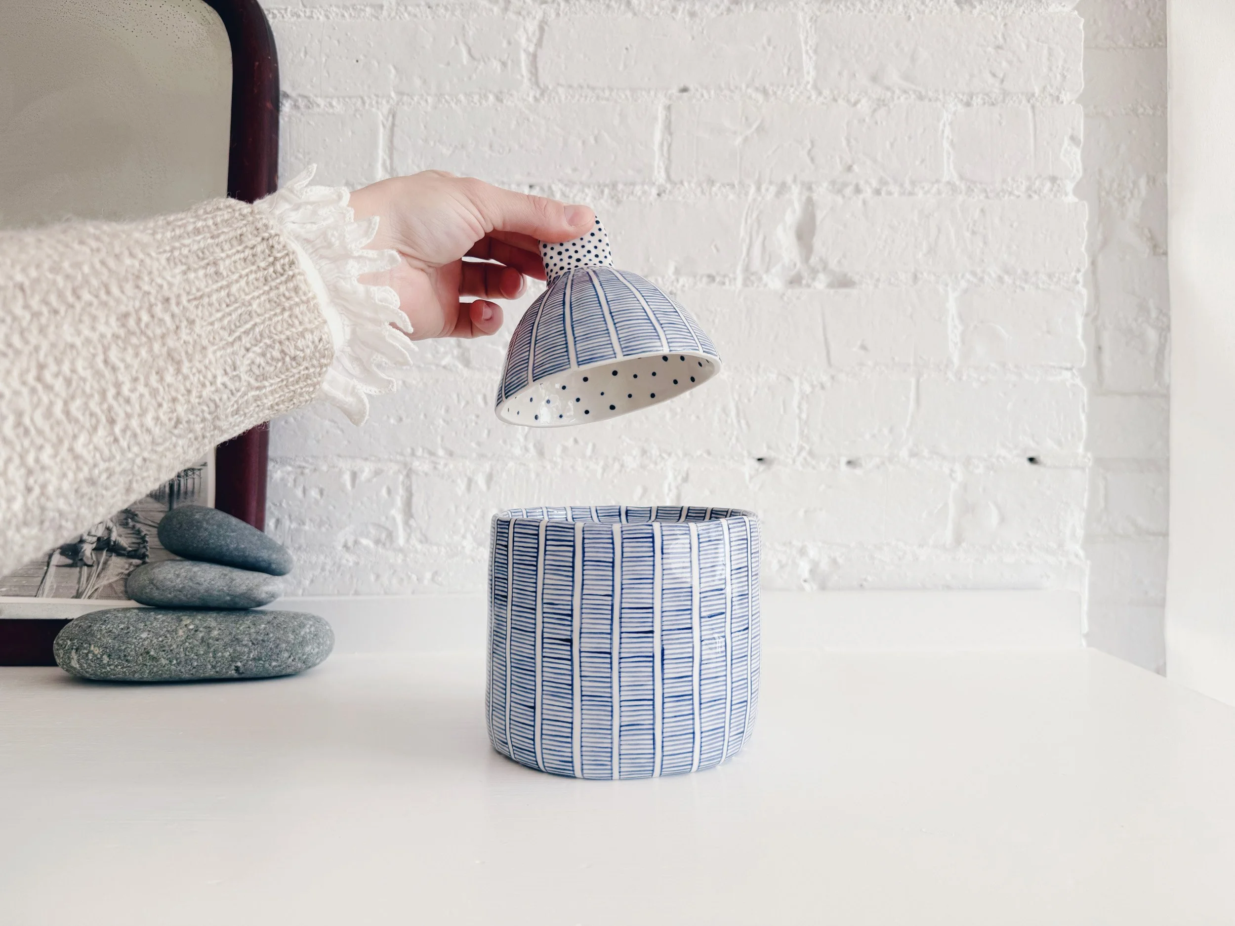Blue and white, handmade ceramic jar.