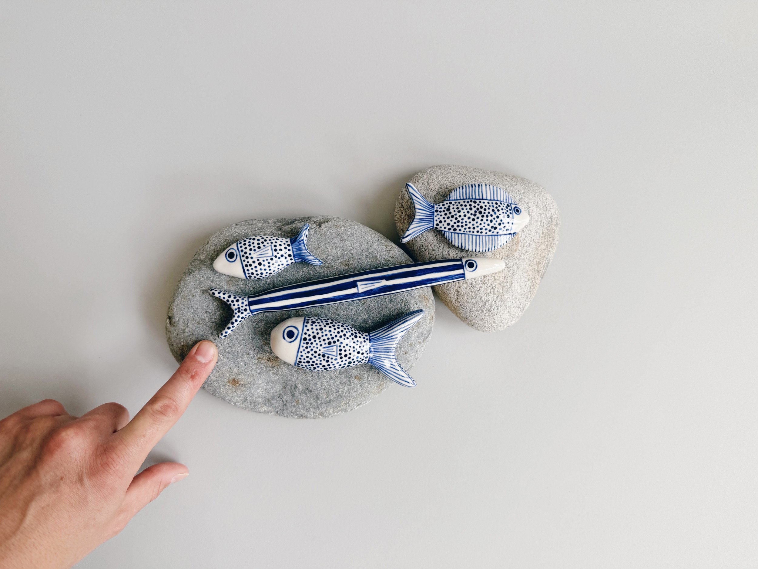 Blue and white, handmade ceramic fish.