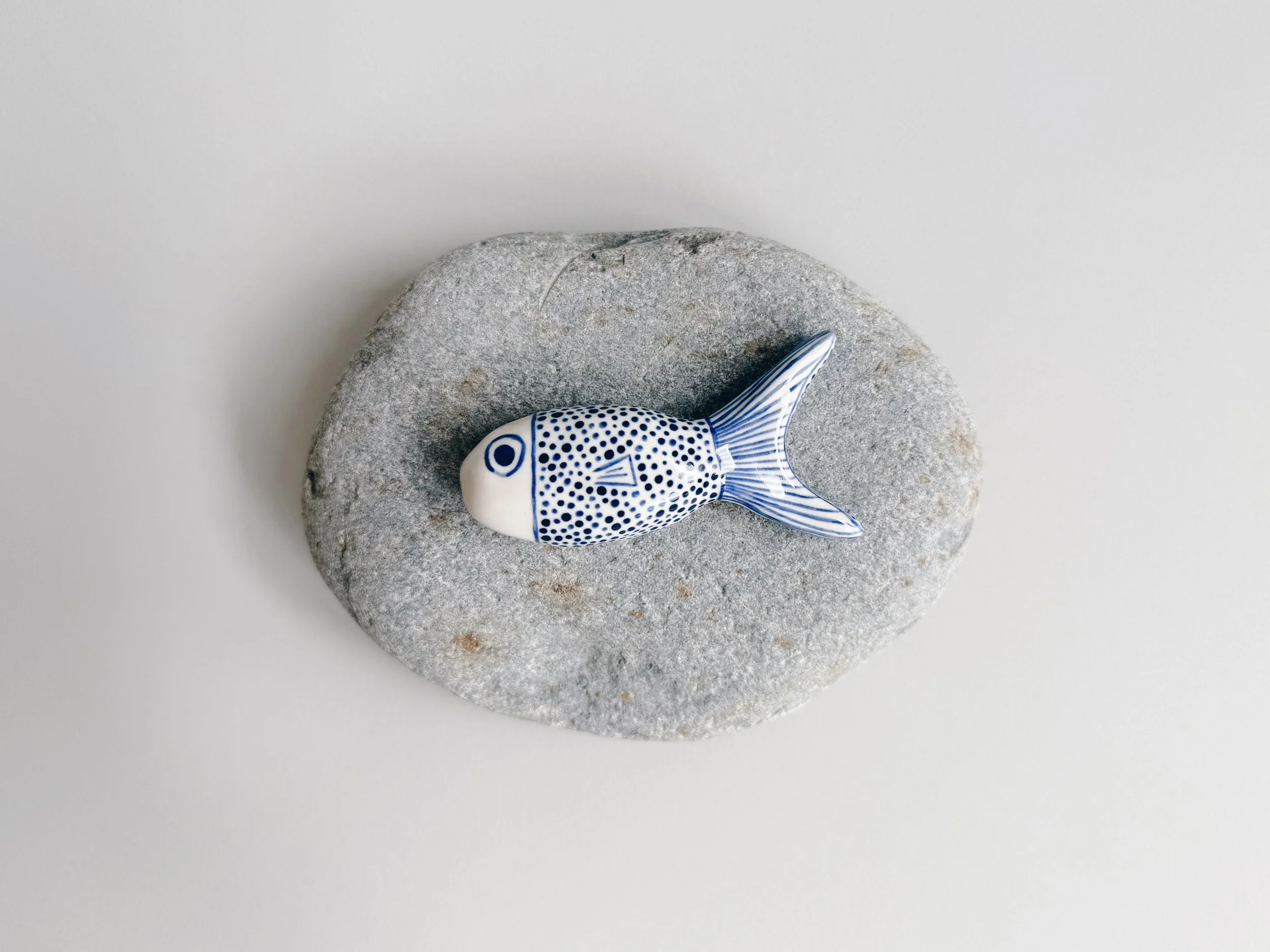 Blue and white, handmade ceramic fish.