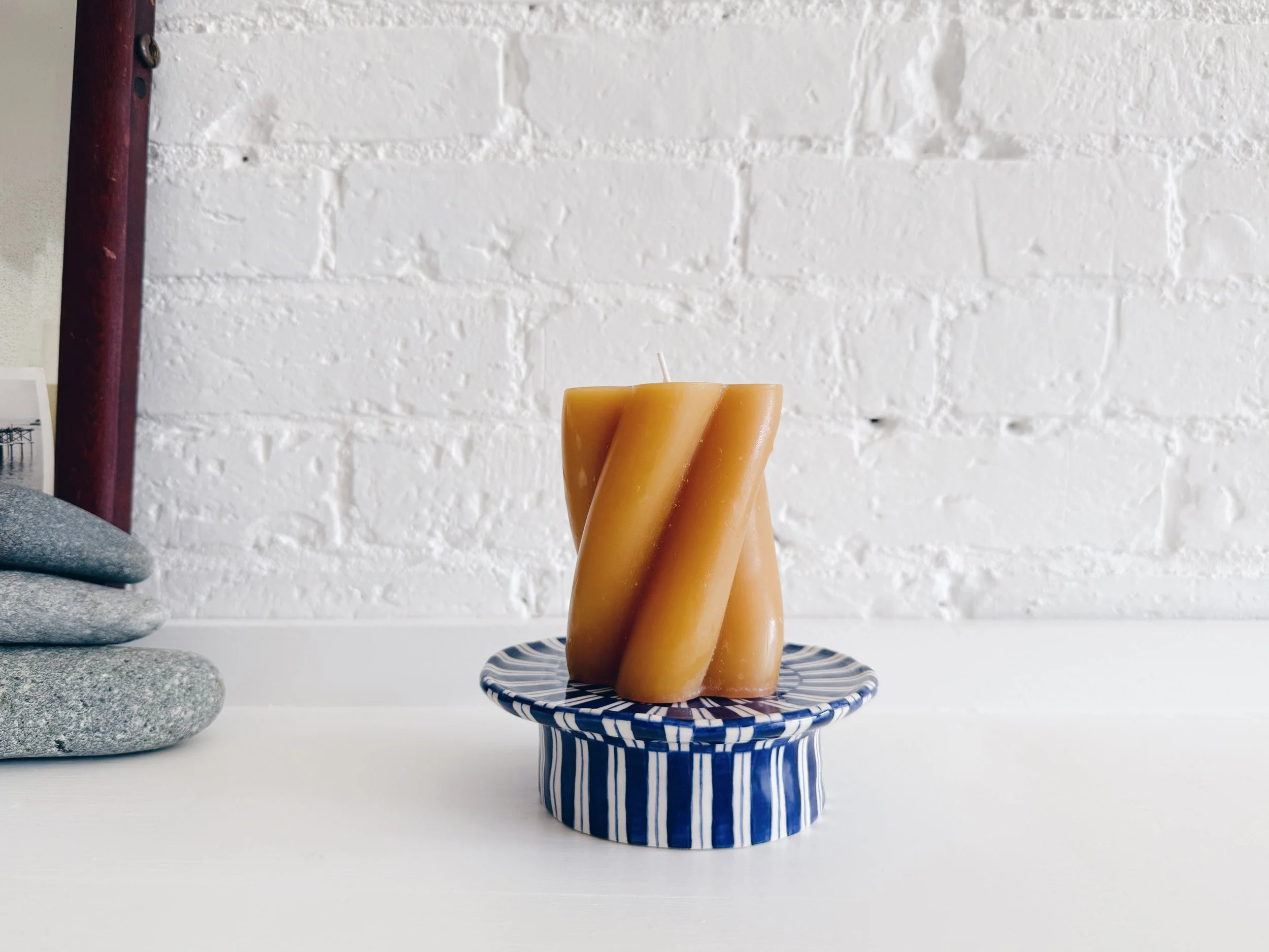 Blue and white, handmade ceramic raised plate.