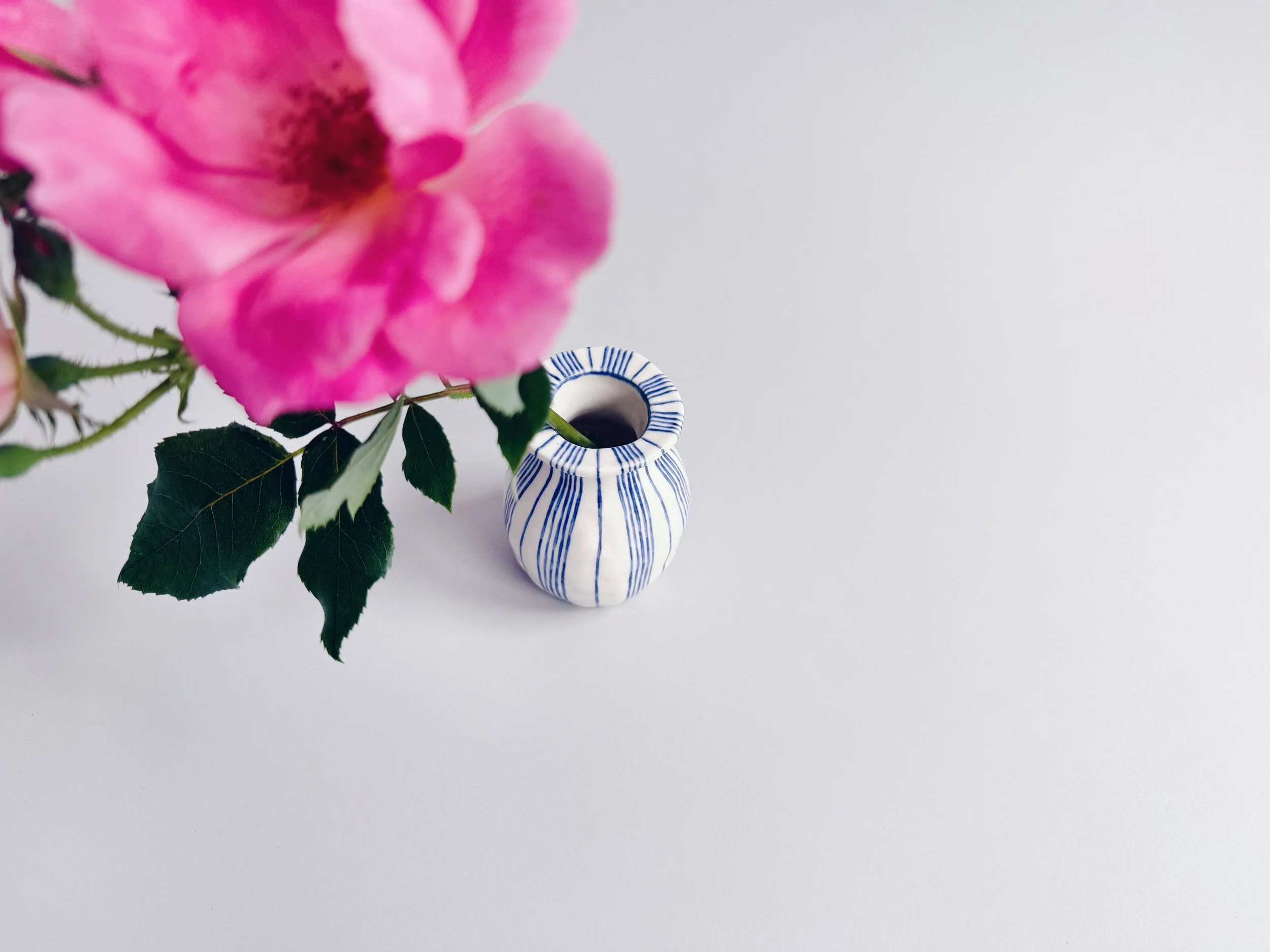 Blue and white, handmade ceramic vase.