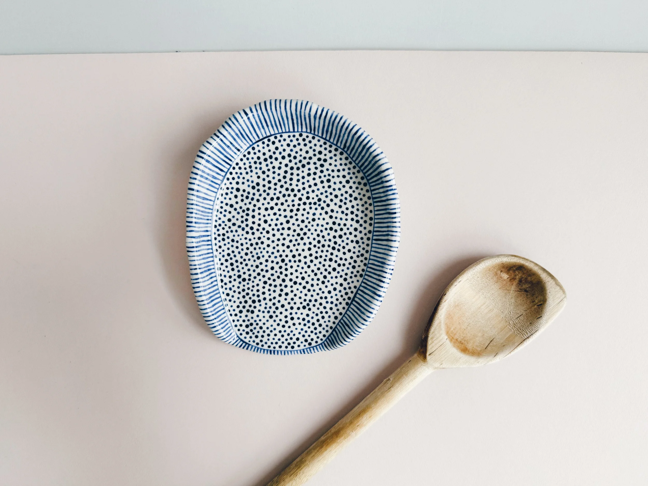 Blue and white, handmade ceramic spoon rest.