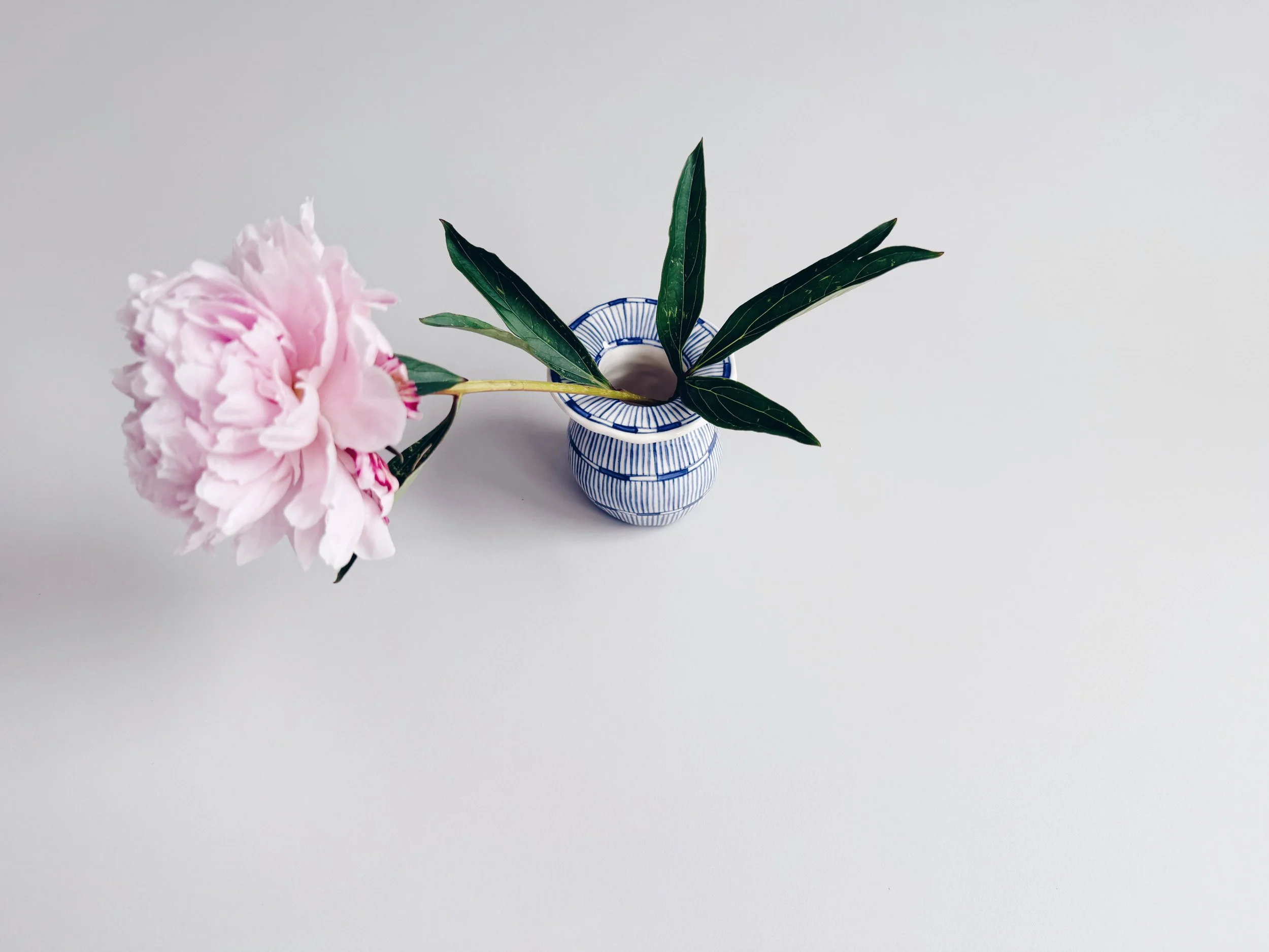 Blue and white, handmade ceramic vase.