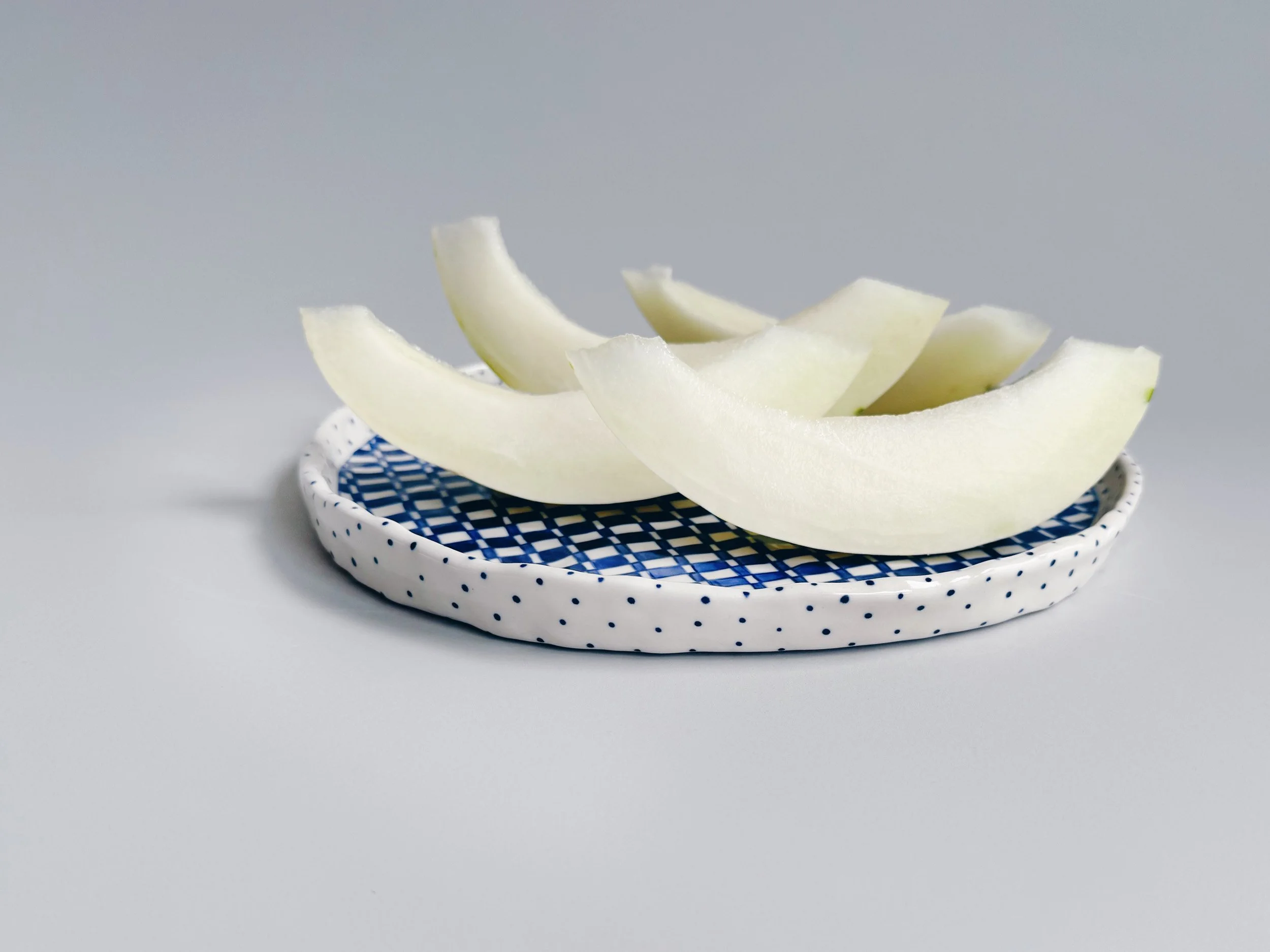 Blue and white, handmade ceramic plate.