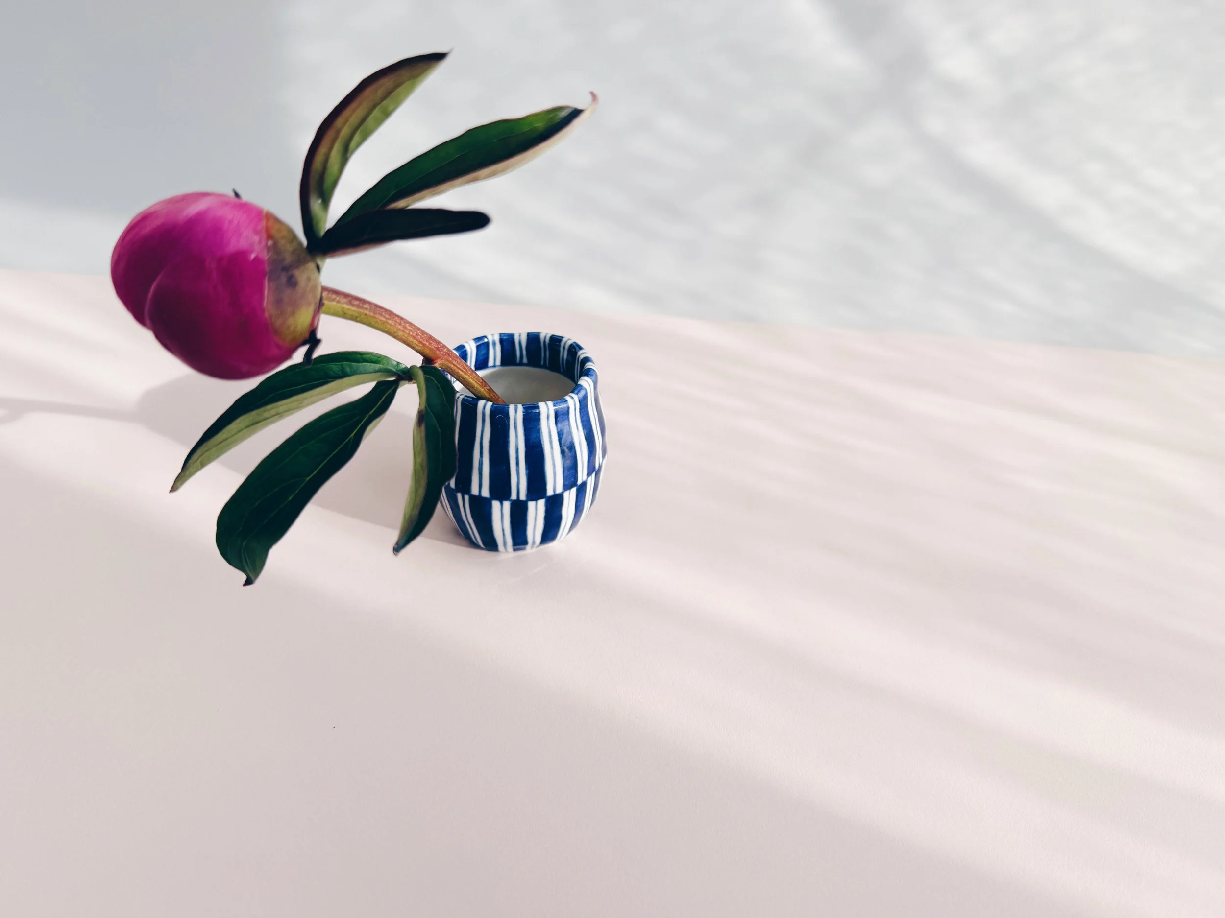 Blue and white, handmade ceramic vase.