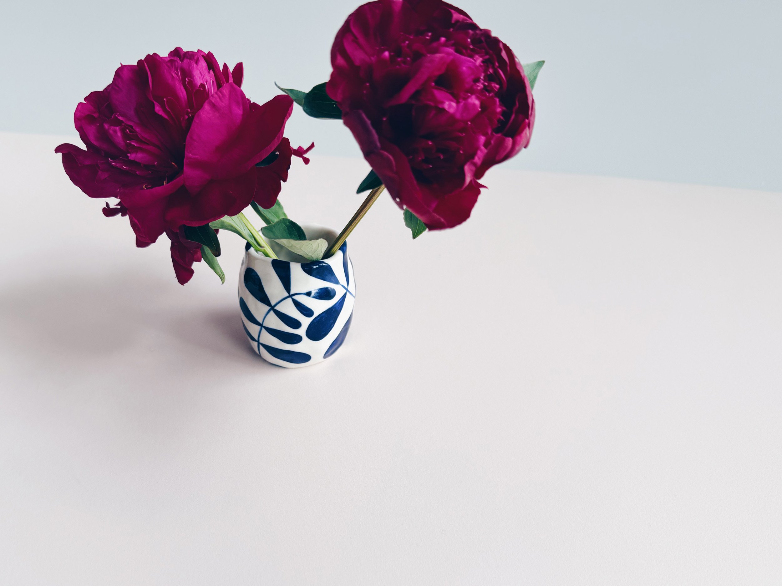 Blue and white, handmade ceramic vase.
