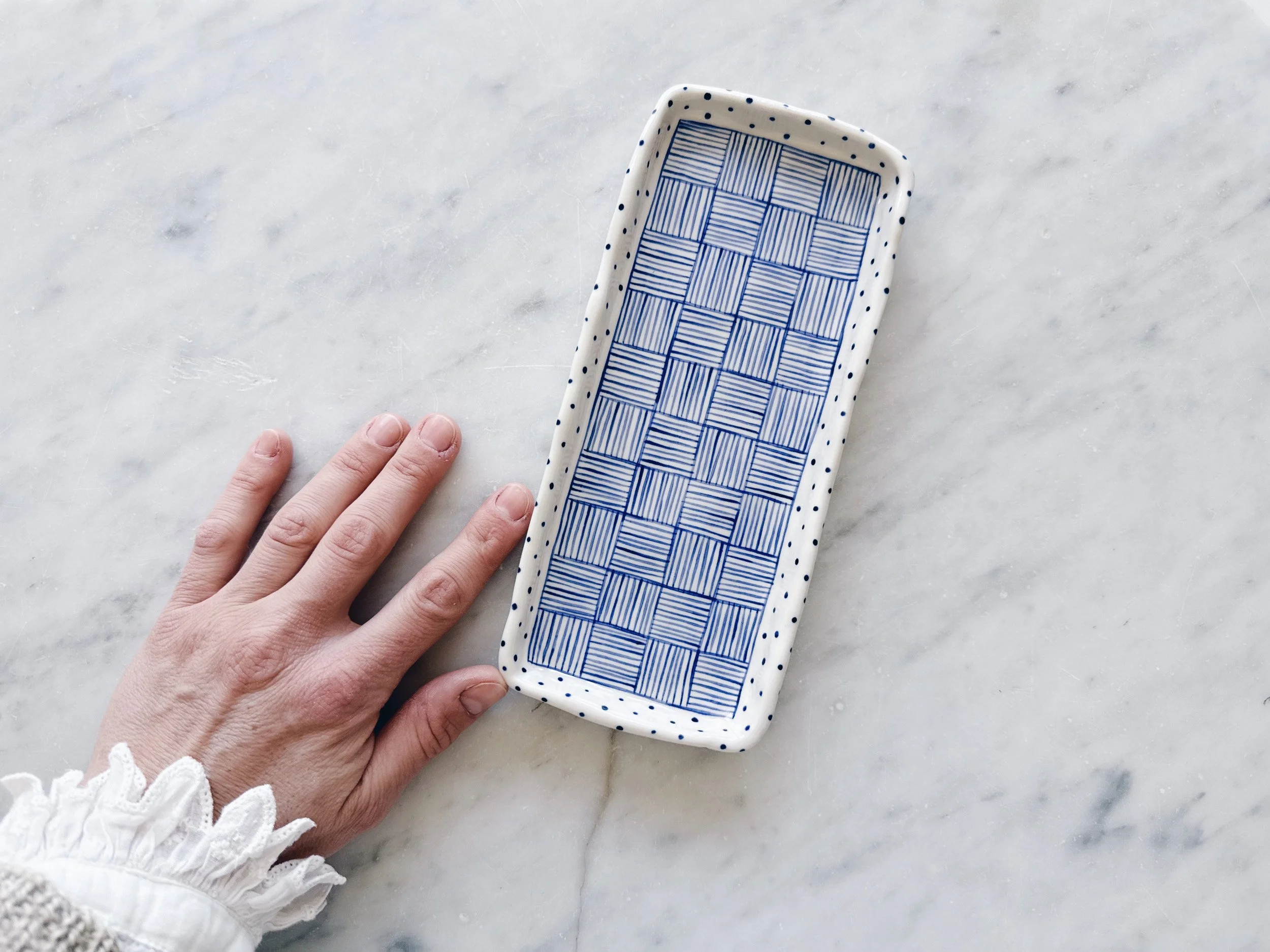 Blue and white, handmade ceramic plate.