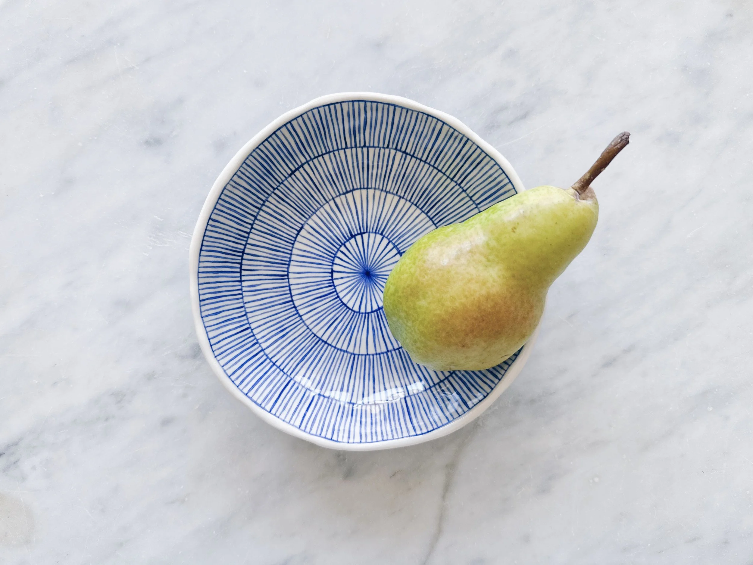 Blue and white, handmade ceramic bowl.