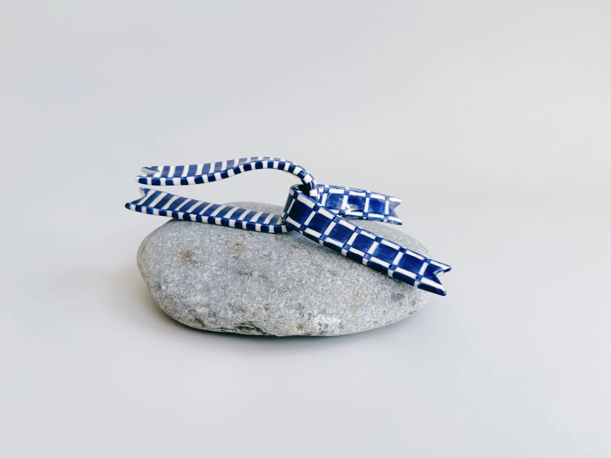 Blue and white, handmade ceramic ribbon