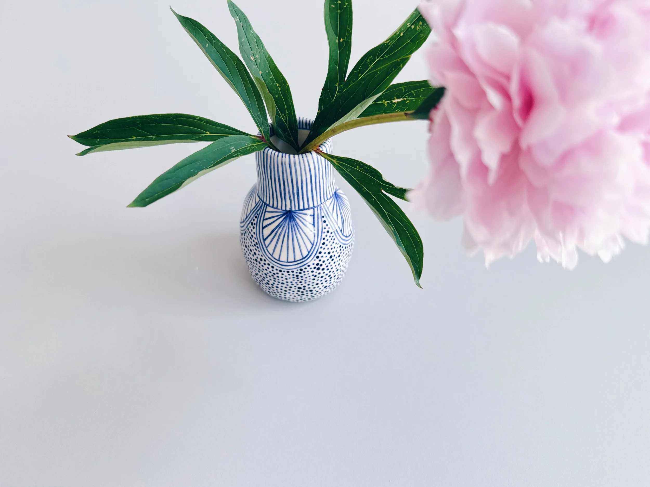 Blue and white, handmade ceramic vase.