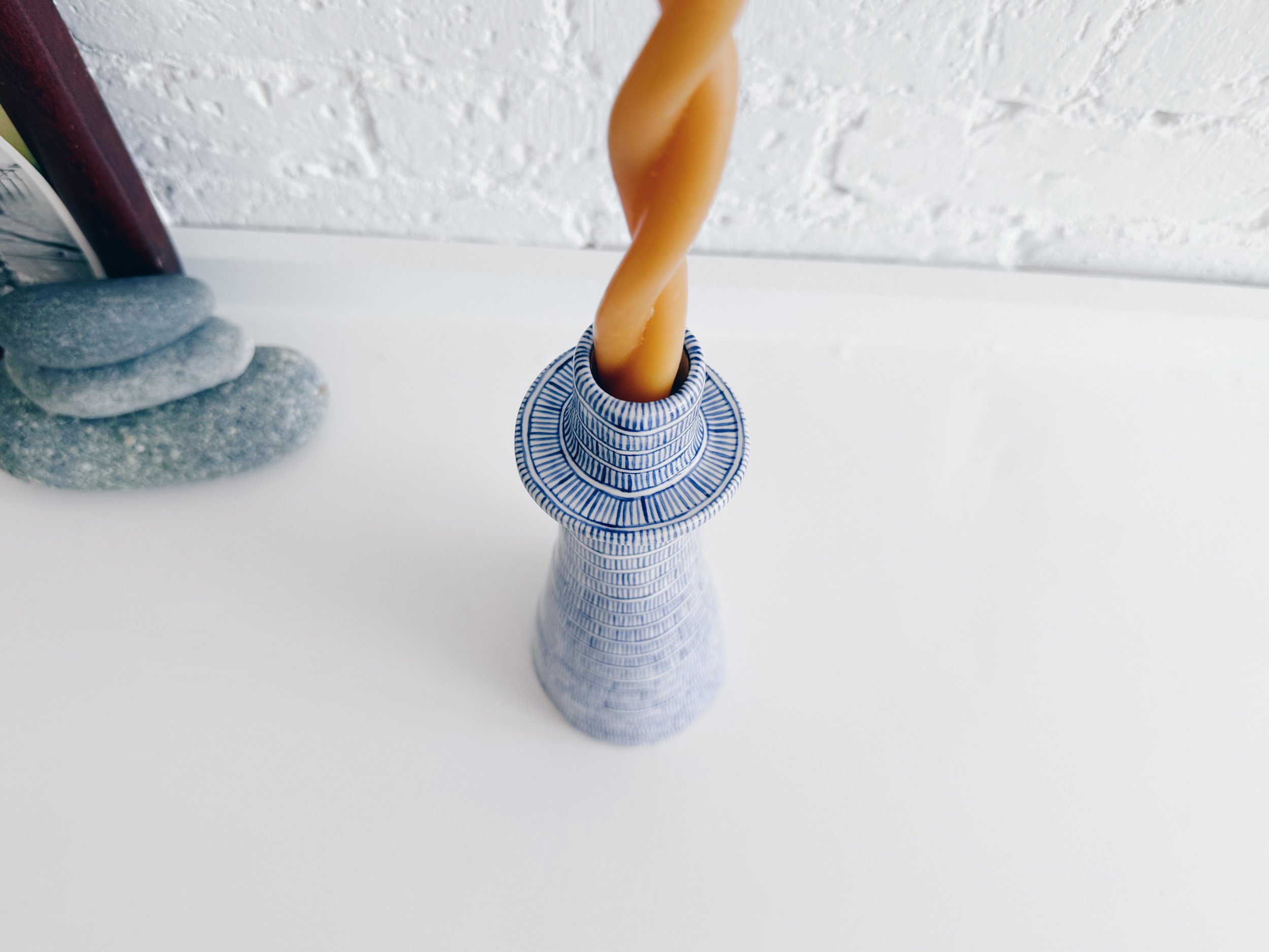 Blue and white, handmade ceramic candleholder.