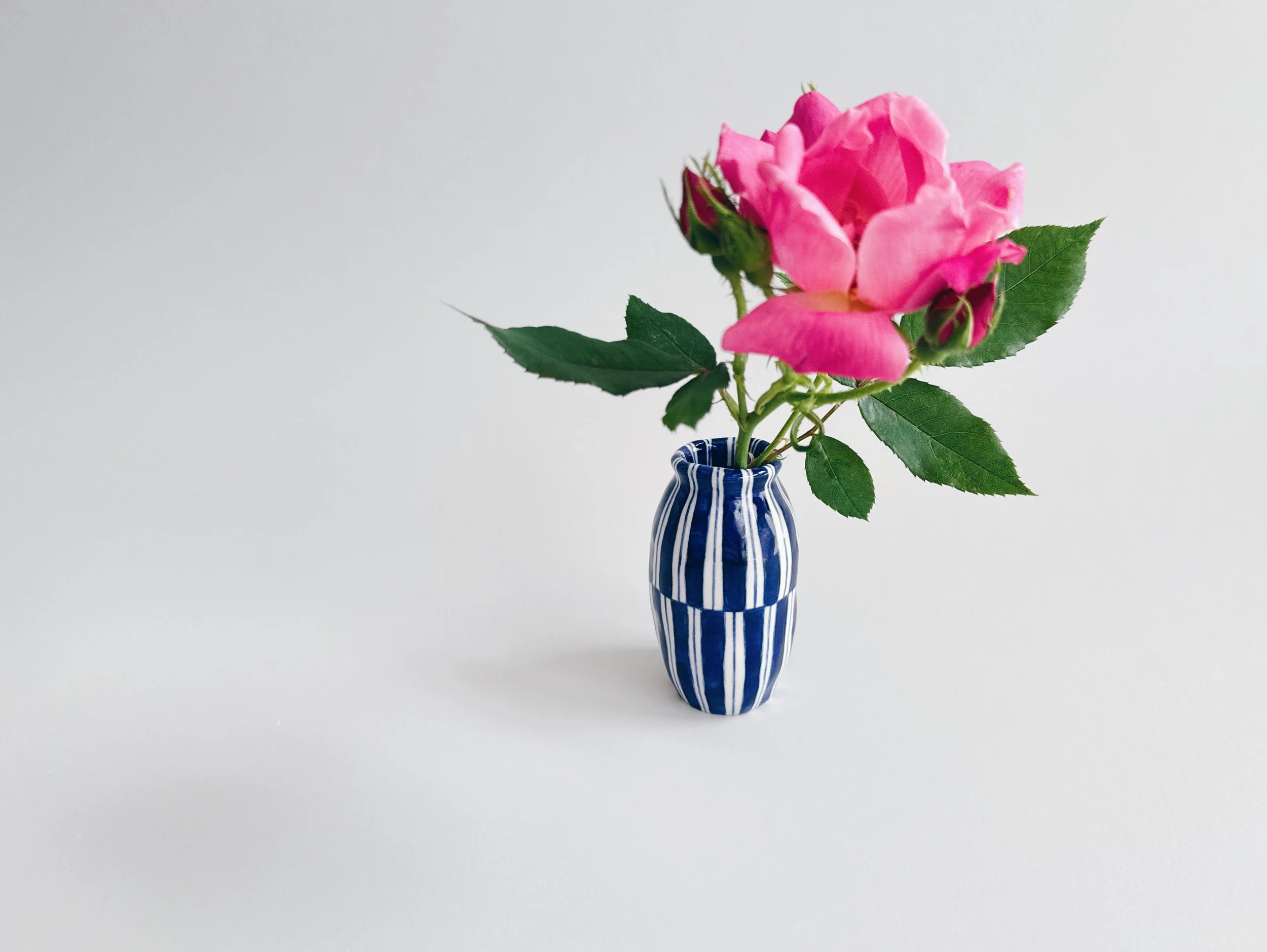 Blue and white, handmade ceramic vase.
