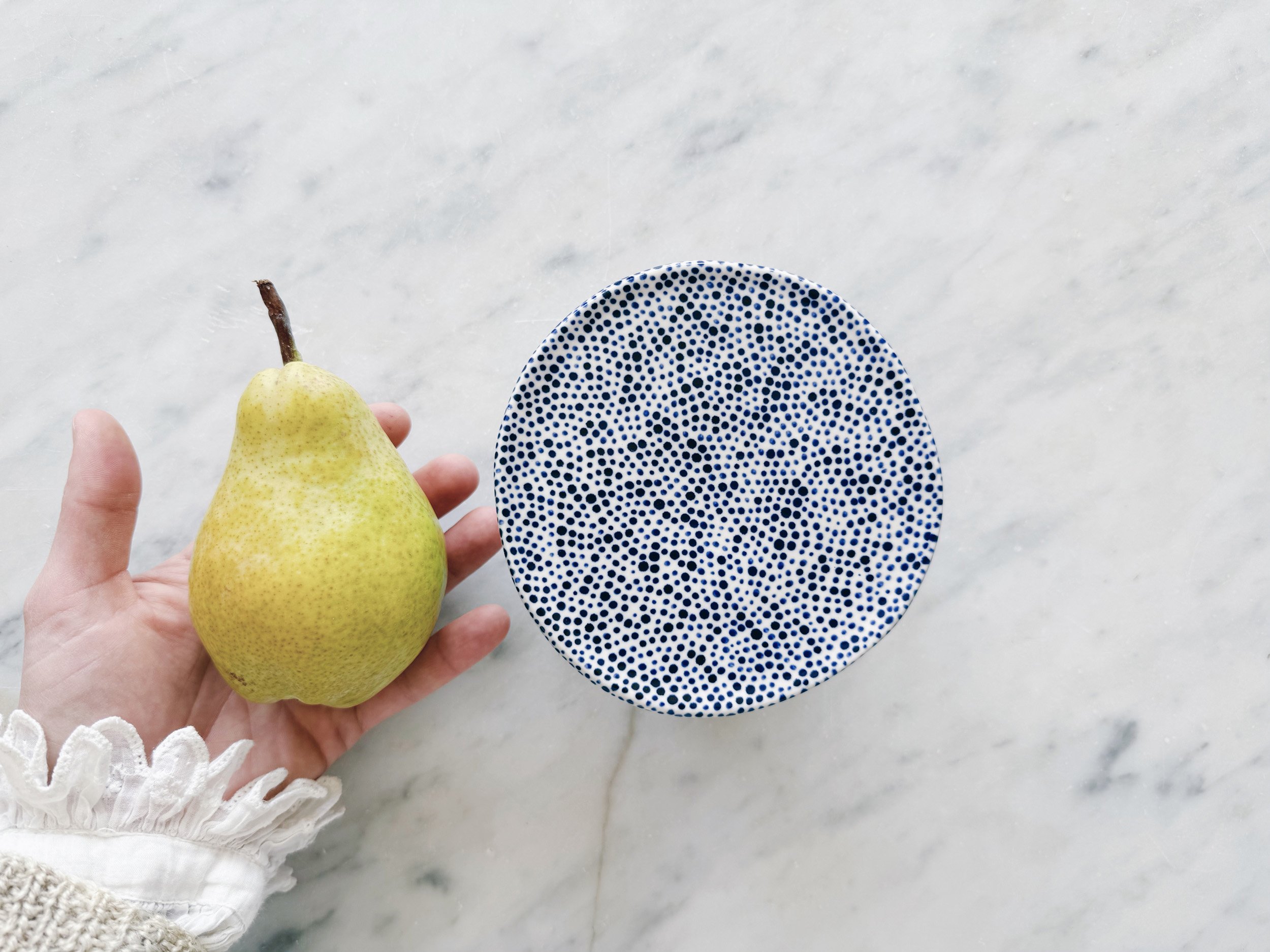 Blue and white, handmade ceramic raised plate.