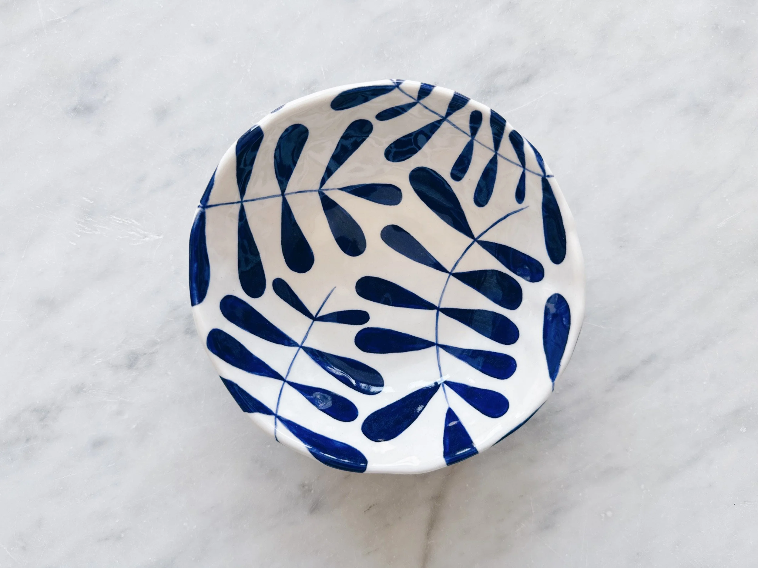 Blue and white, handmade ceramic bowl.
