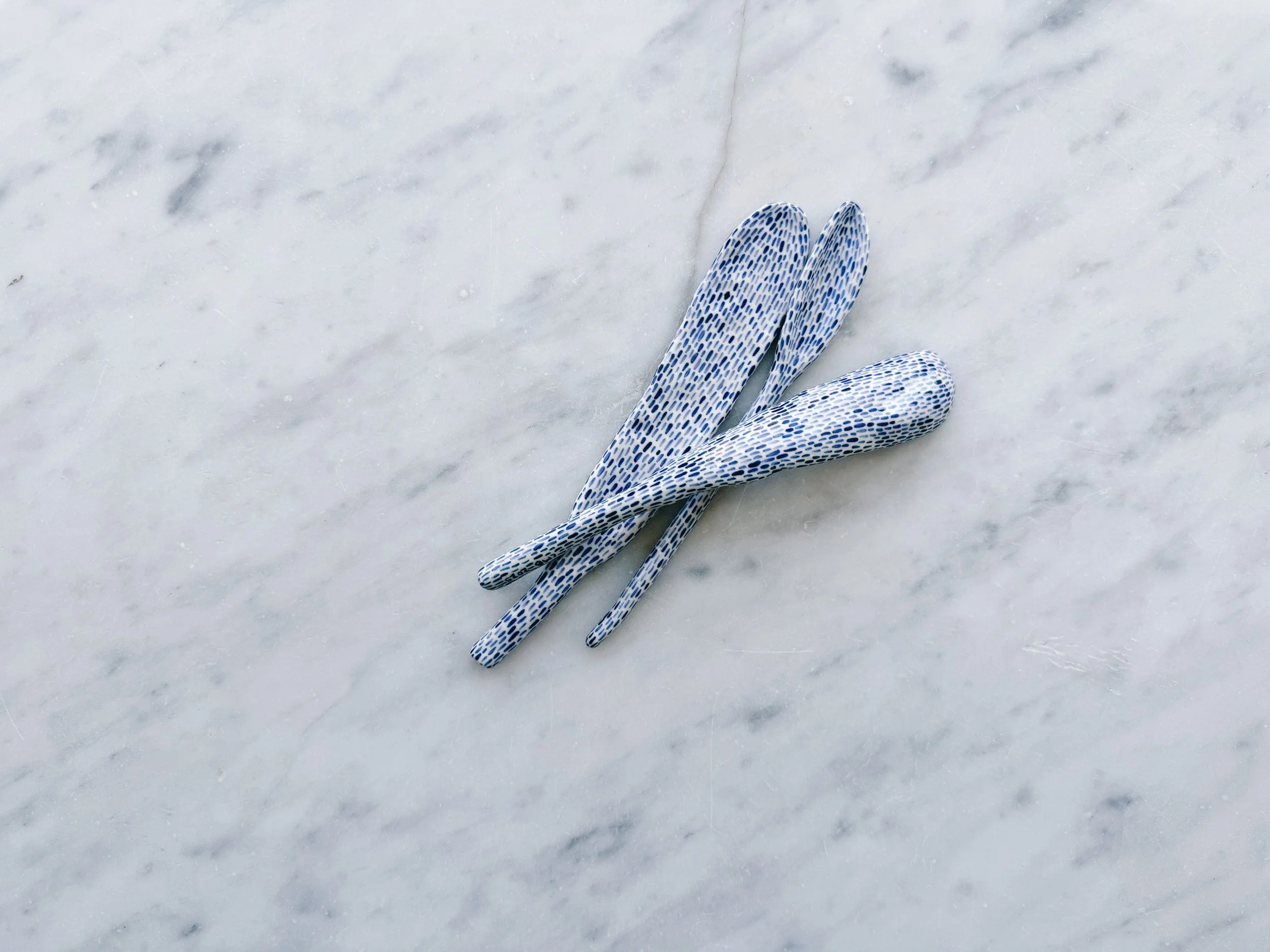 Blue and white, handmade ceramic sculpture.