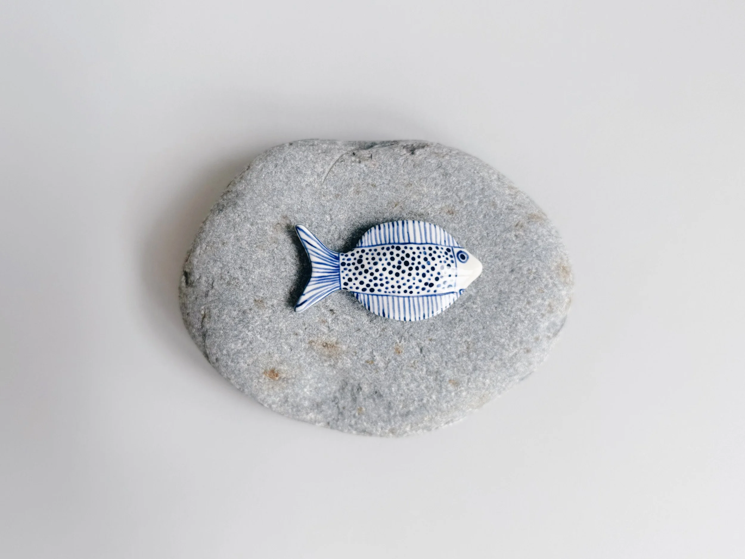 Blue and white, handmade ceramic fish.