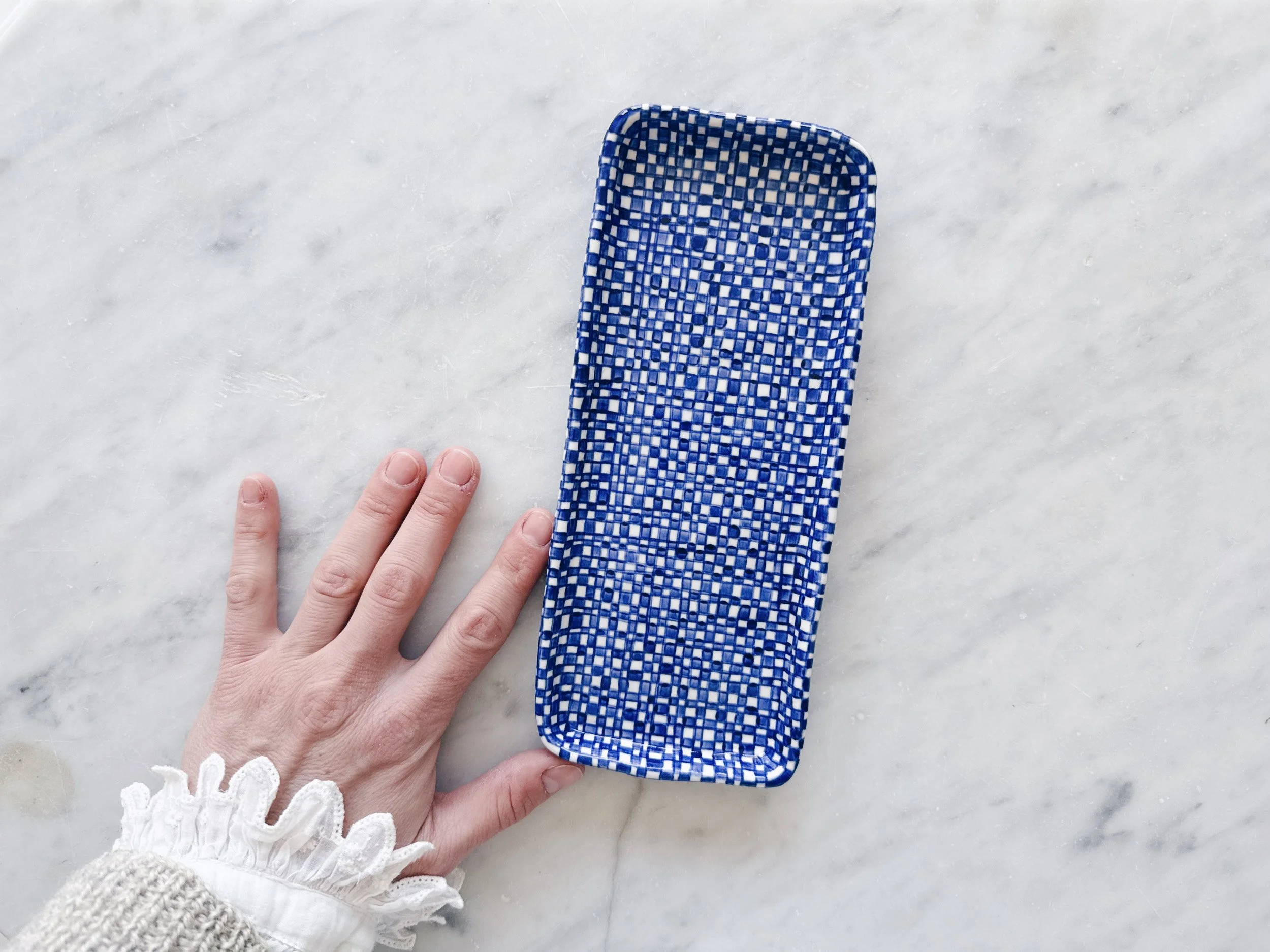 Blue and white, handmade ceramic plate.