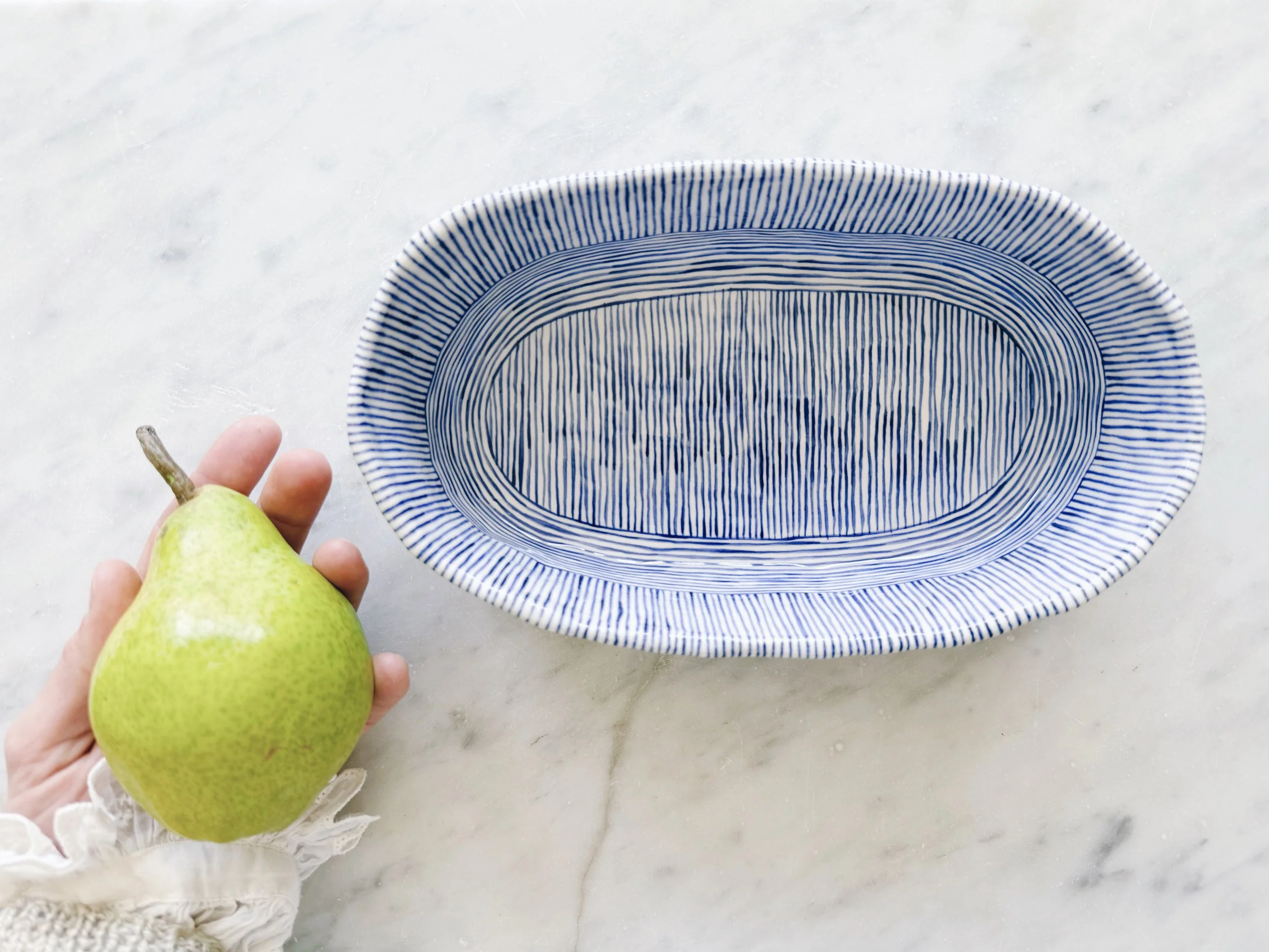 Blue and white, handmade ceramic dish.