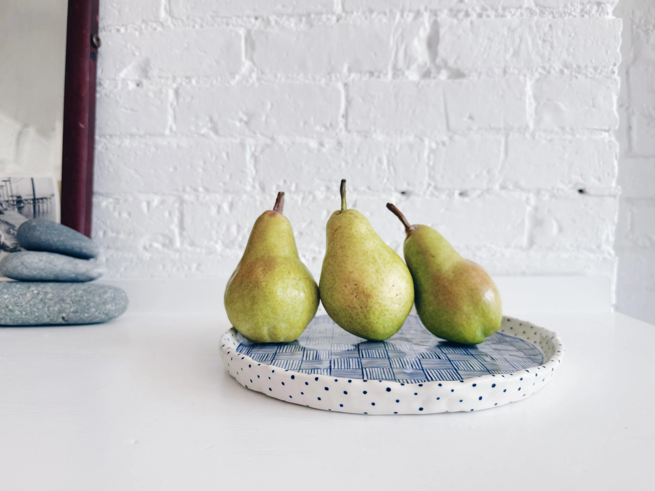 Blue and white, handmade ceramic plate.