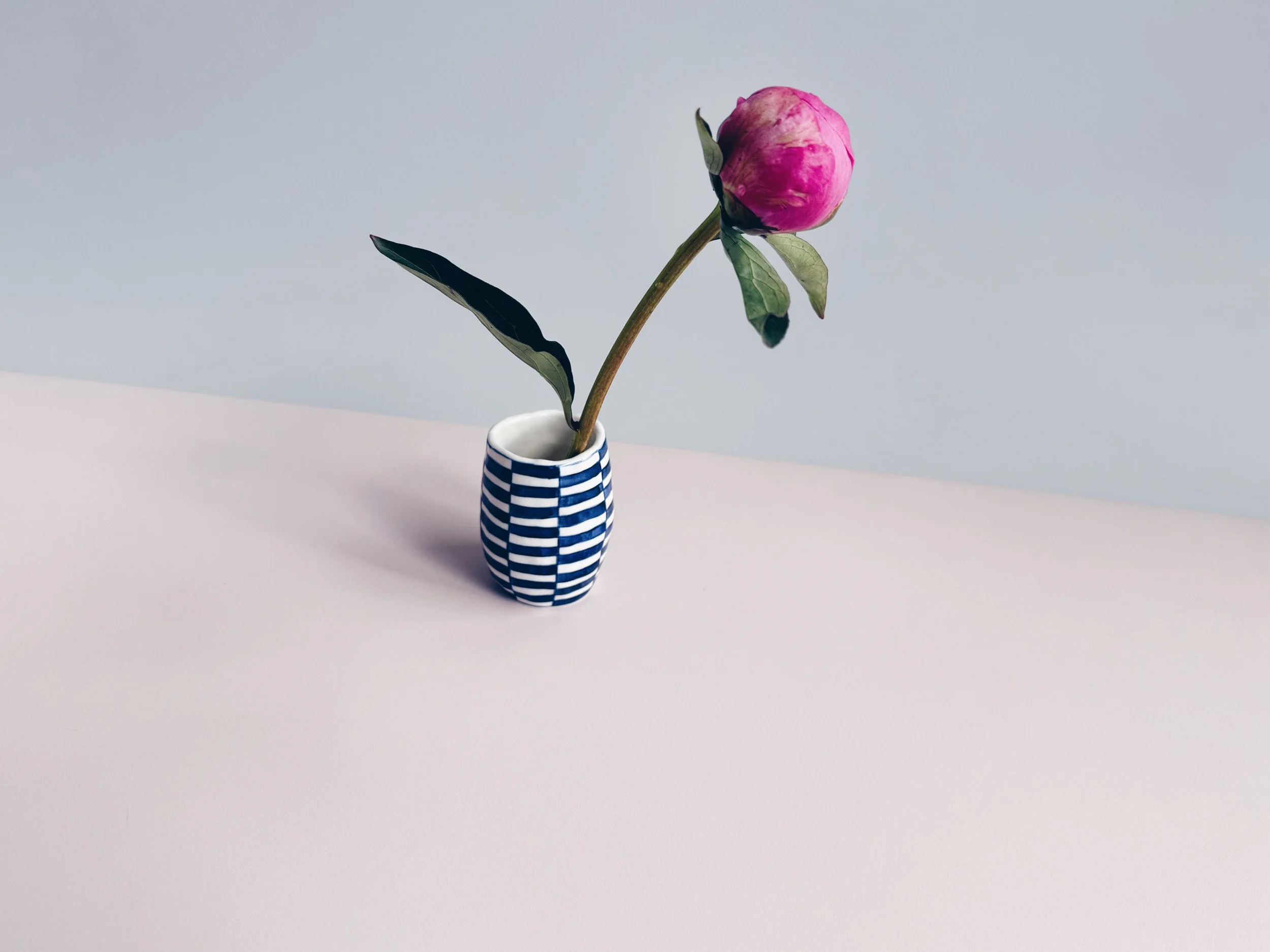 Blue and white, handmade ceramic vase.