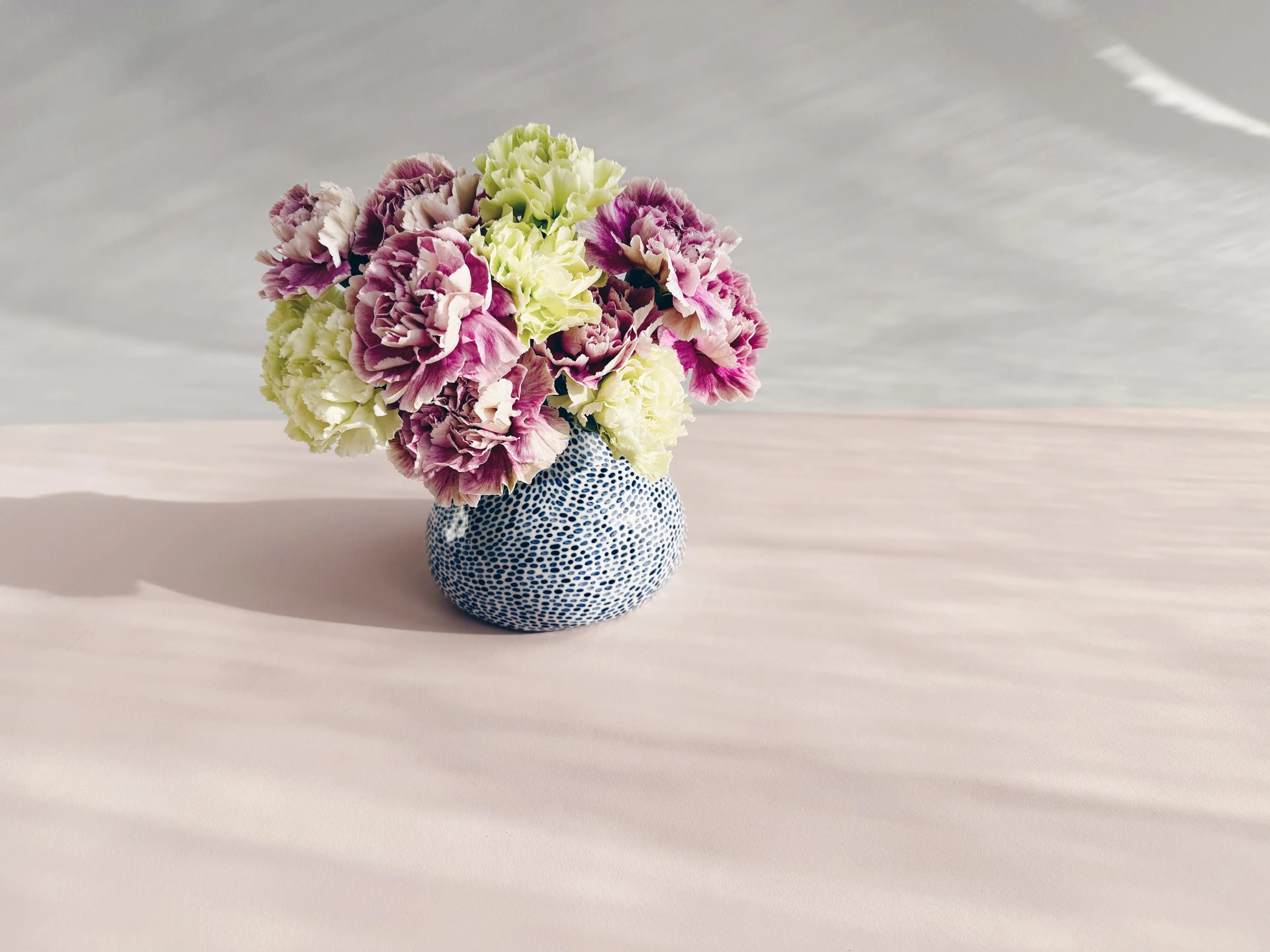 Blue and white, handmade ceramic vase.