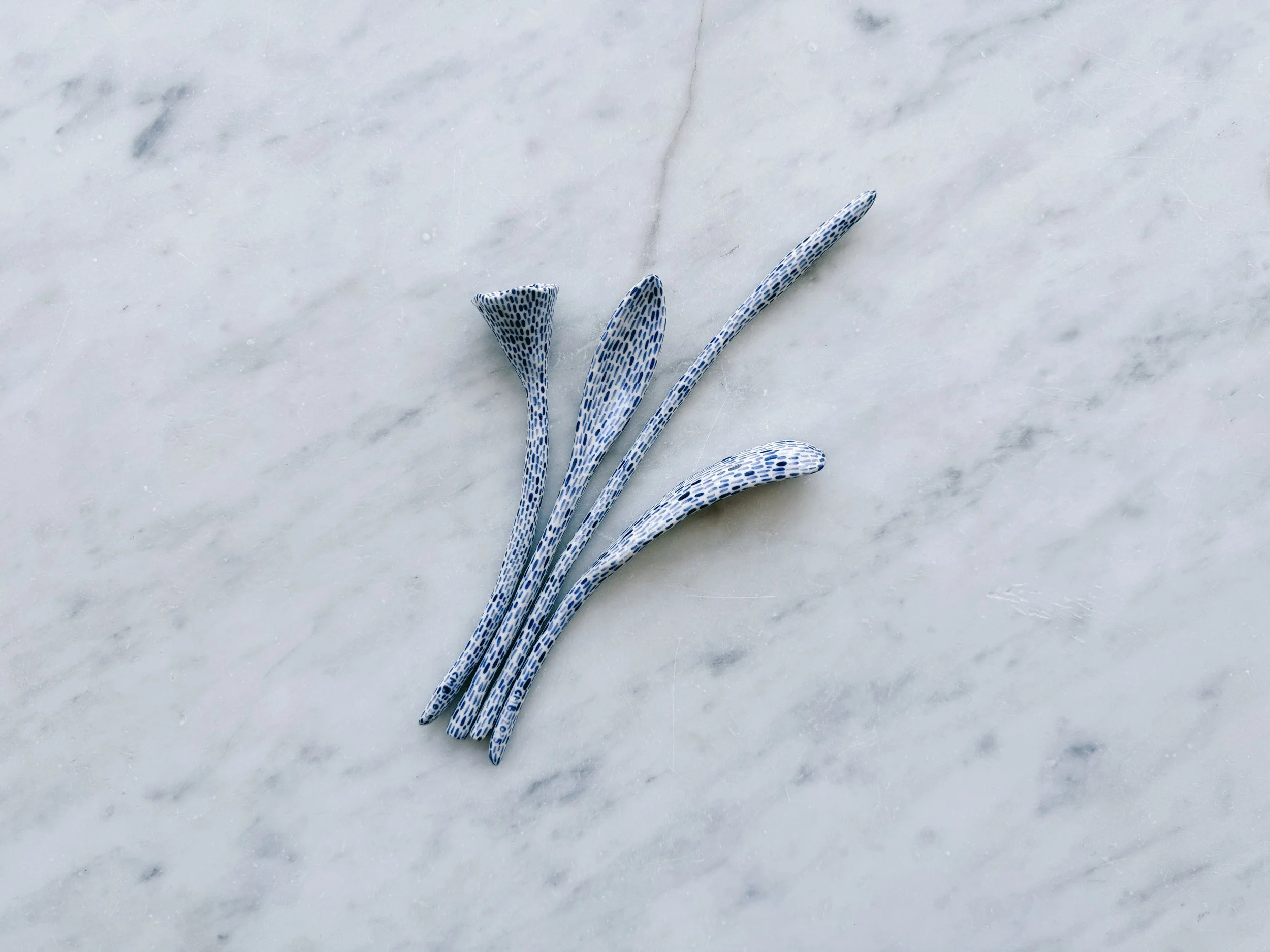 Blue and white, handmade ceramic sculpture.