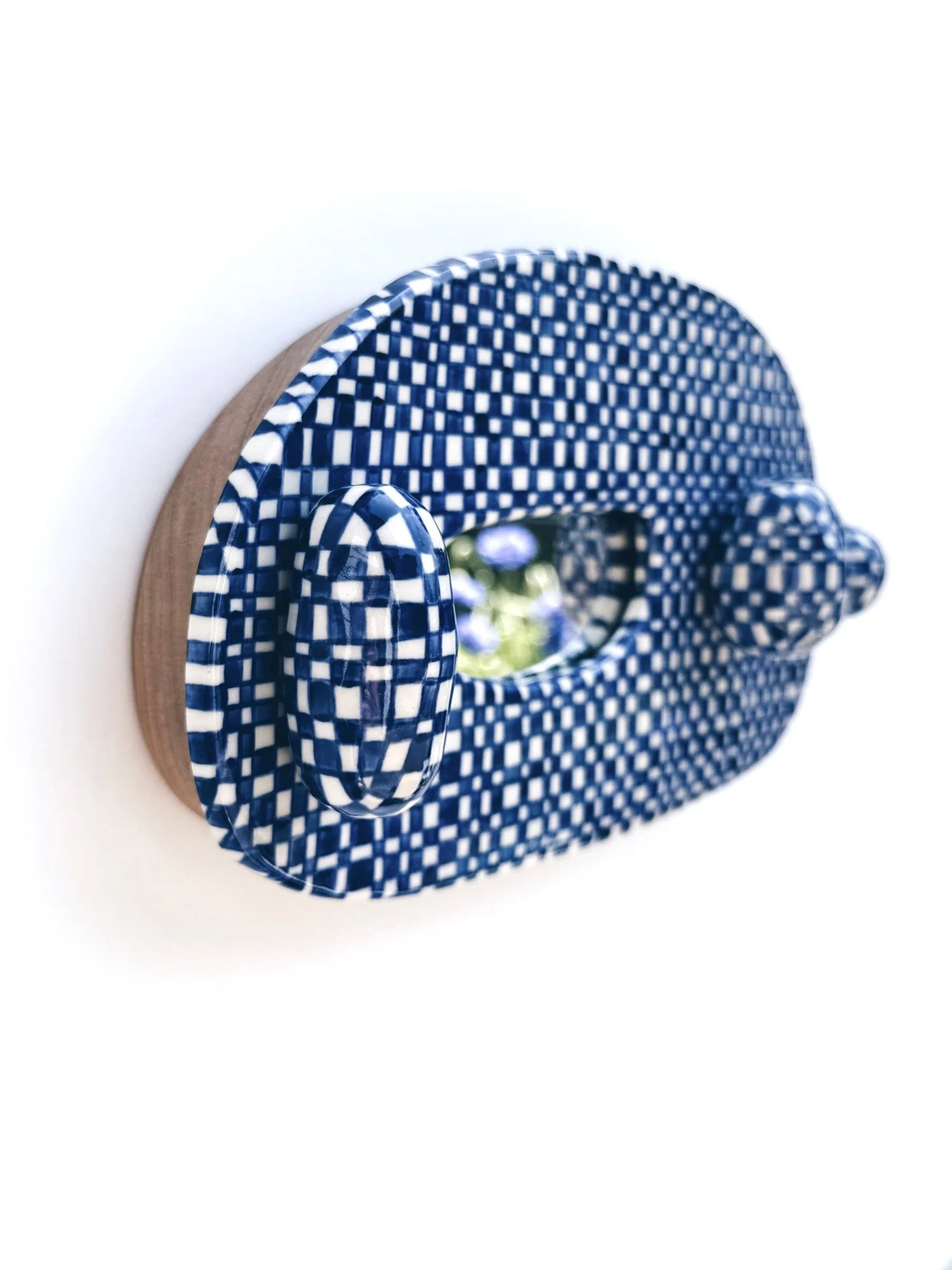 Blue and white, handmade ceramic mirror.