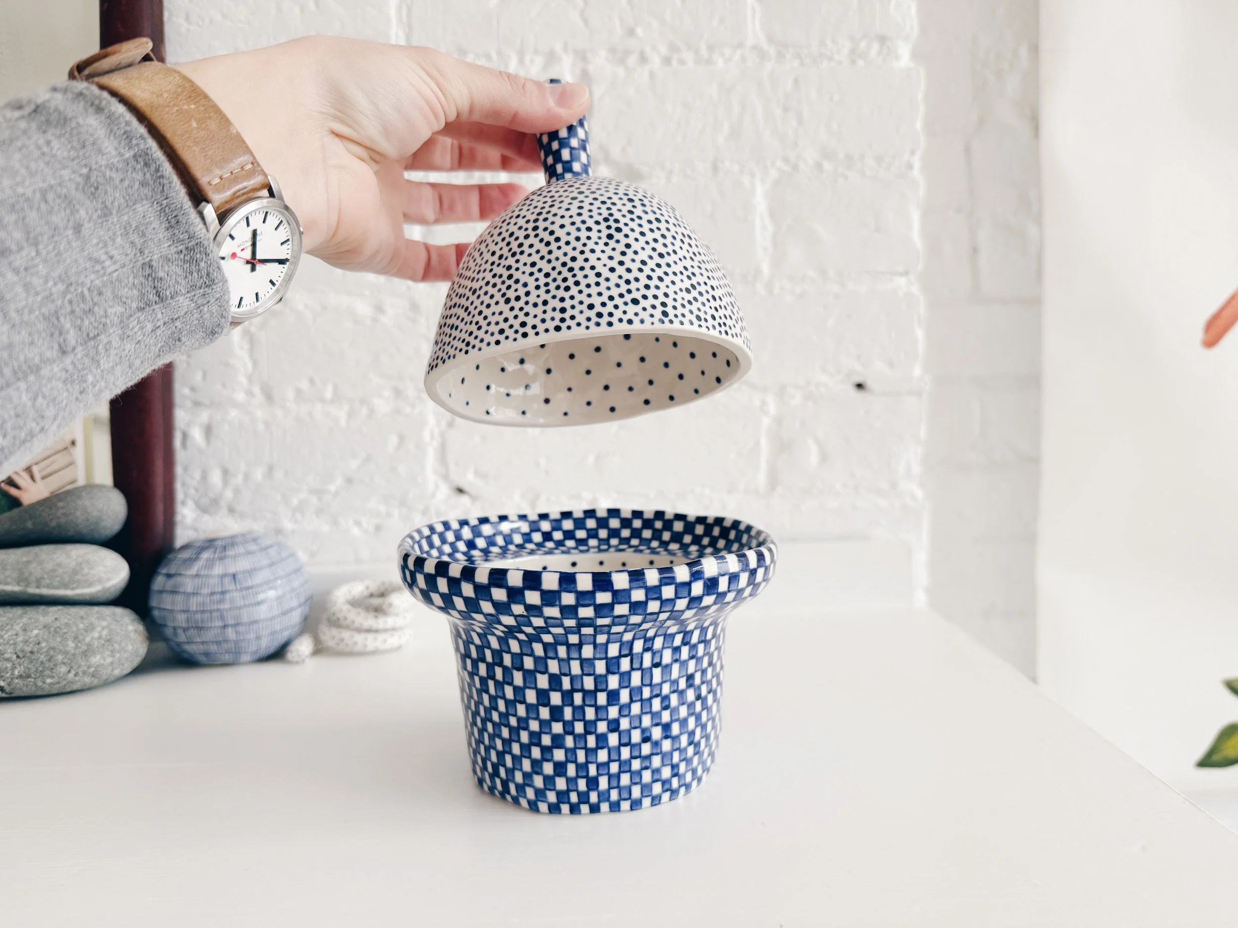 Blue and white, handmade ceramic jar.