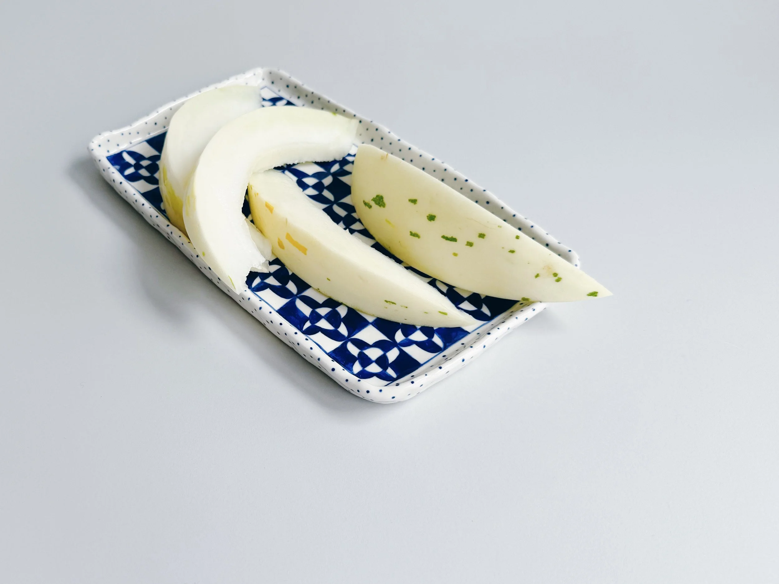 Blue and white, handmade ceramic plate.