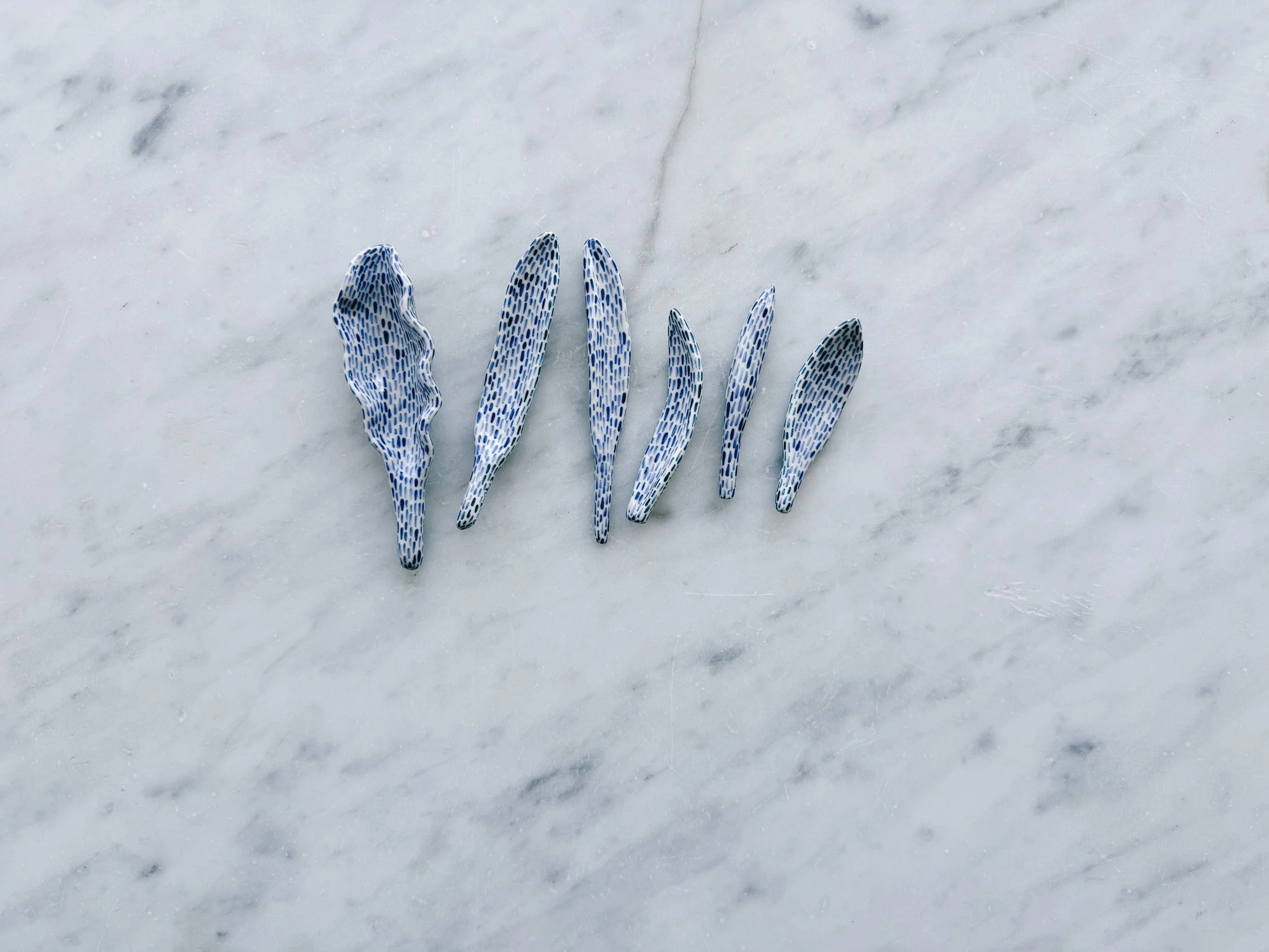 Blue and white, handmade ceramic sculpture.