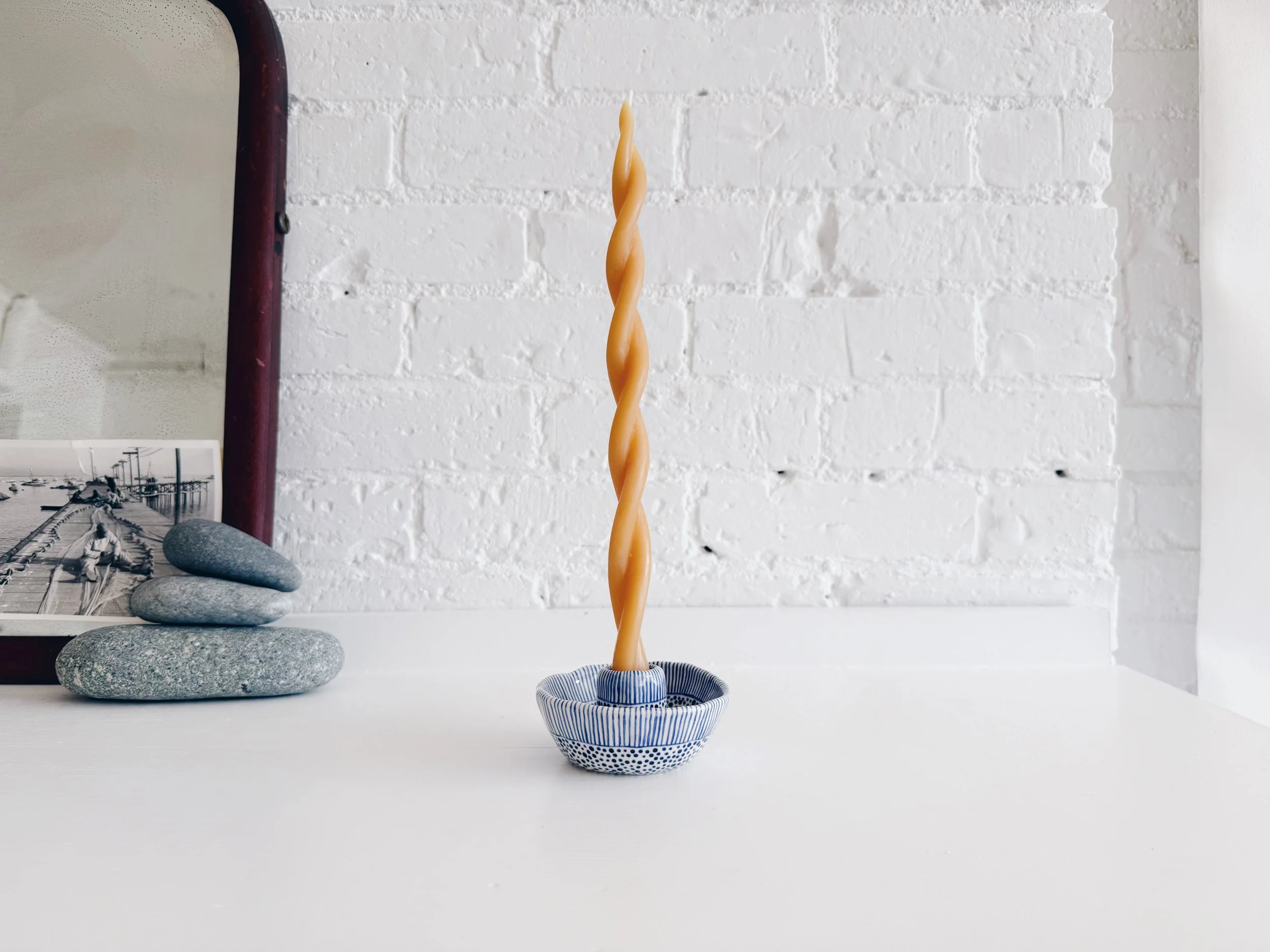 Blue and white, handmade ceramic candleholder.
